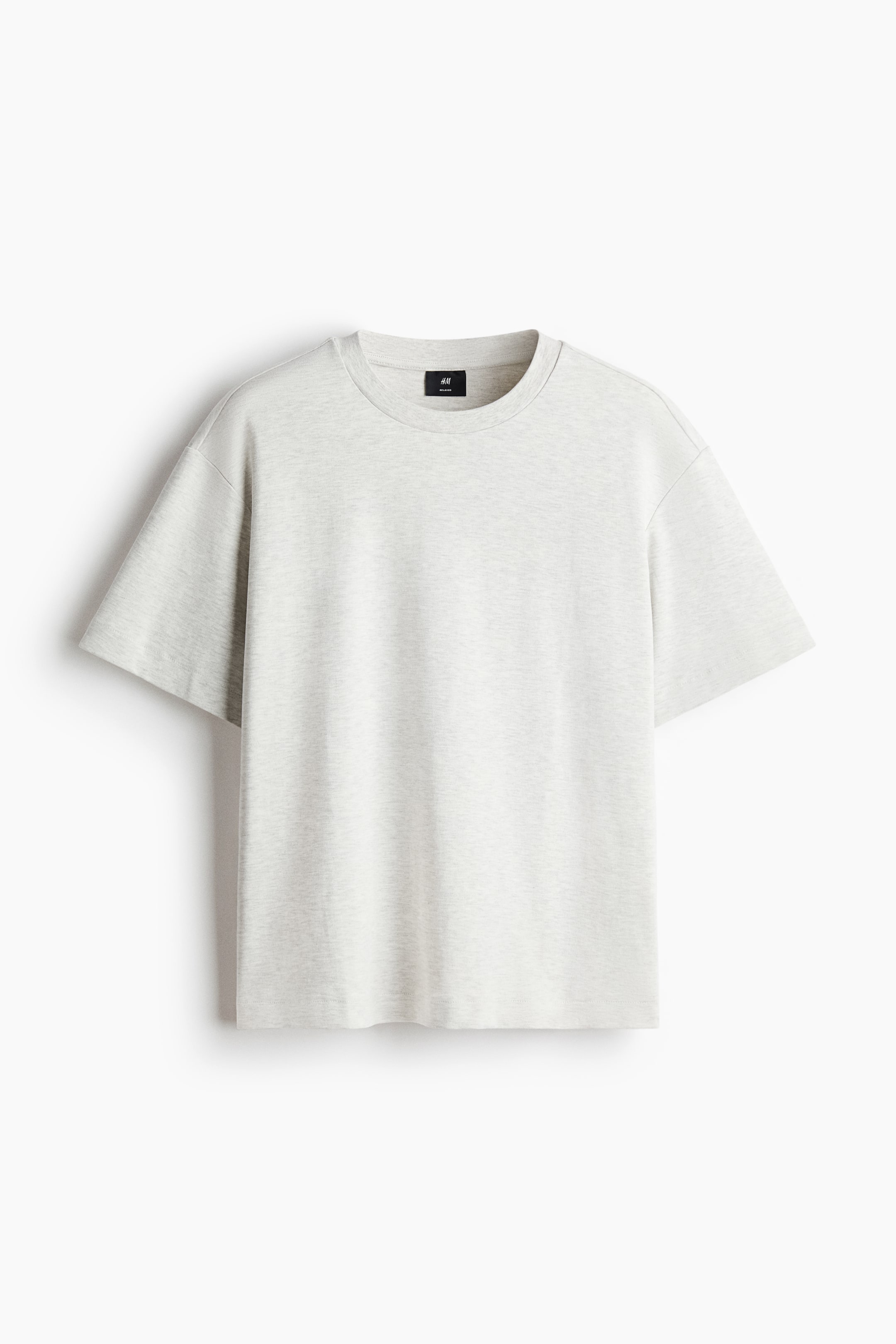 Ver imagen más grande: Camiseta de jersey gris jaspeado claro con un ajuste suelto y cuadrado, cuello redondo con ribete, hombros caídos y dobladillo recto, vista desde el frente.