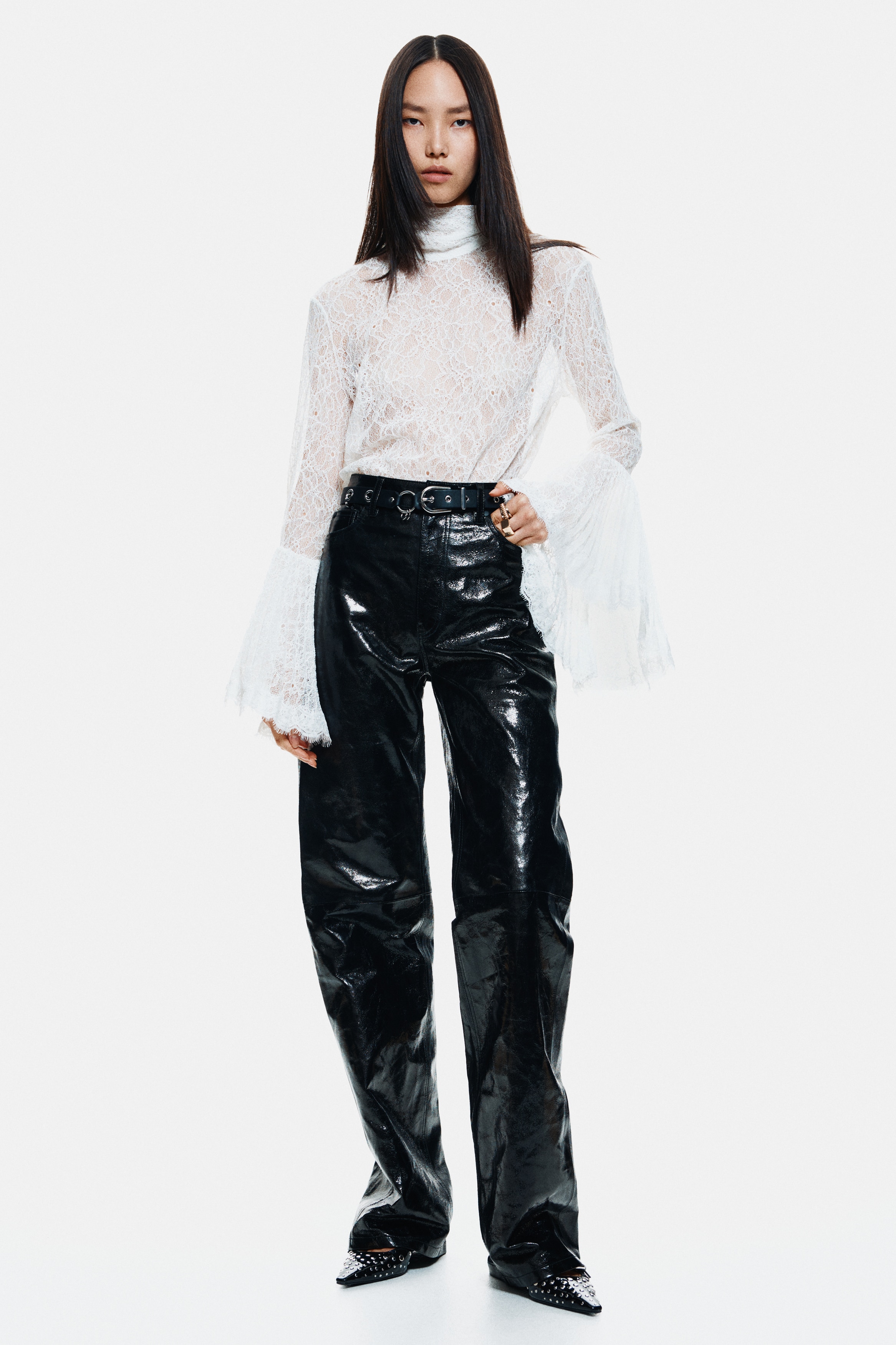 Trumpet-sleeved lace blouse