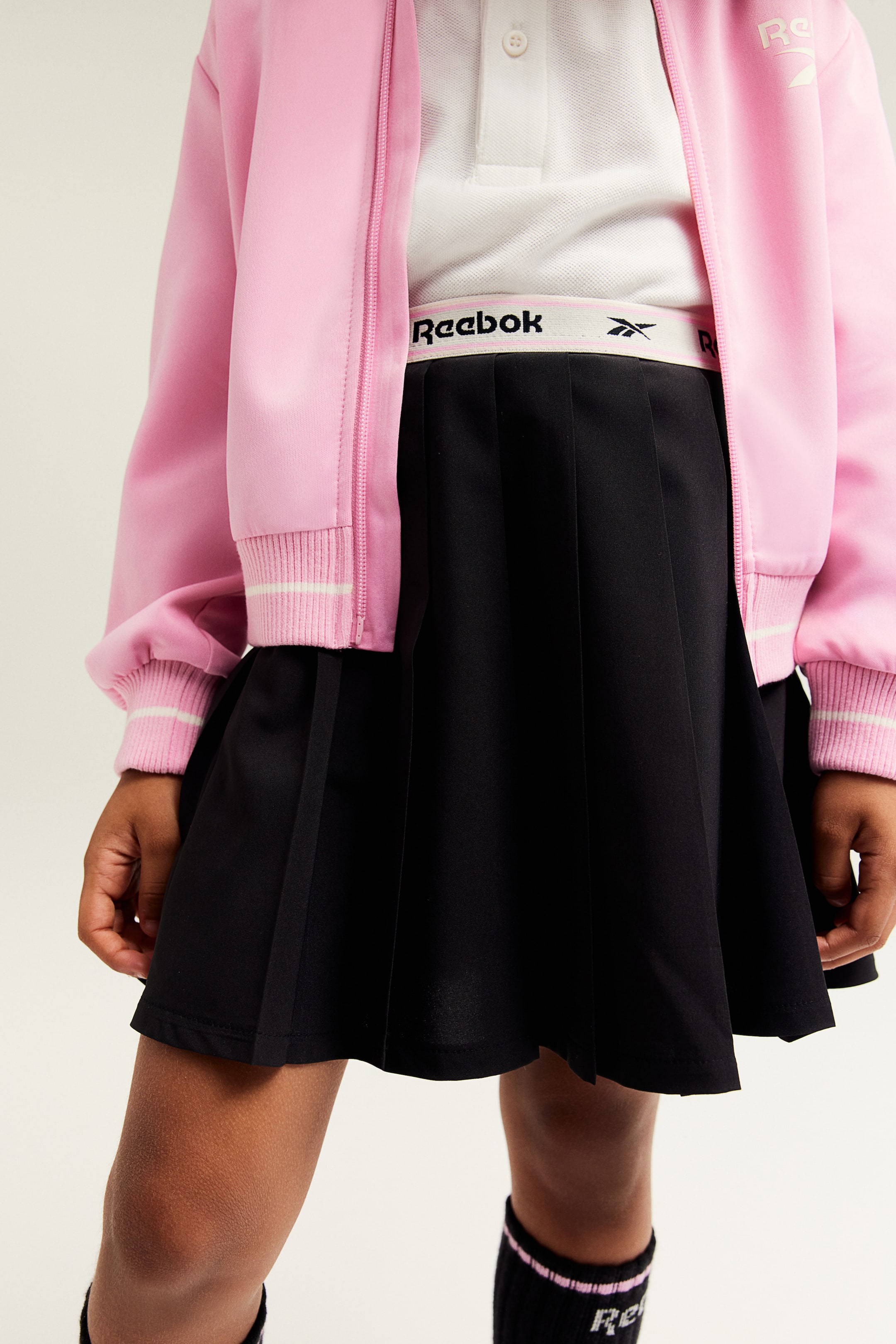 Pleated jersey skirt - Black/Reebok - Kids | H&M GB 2