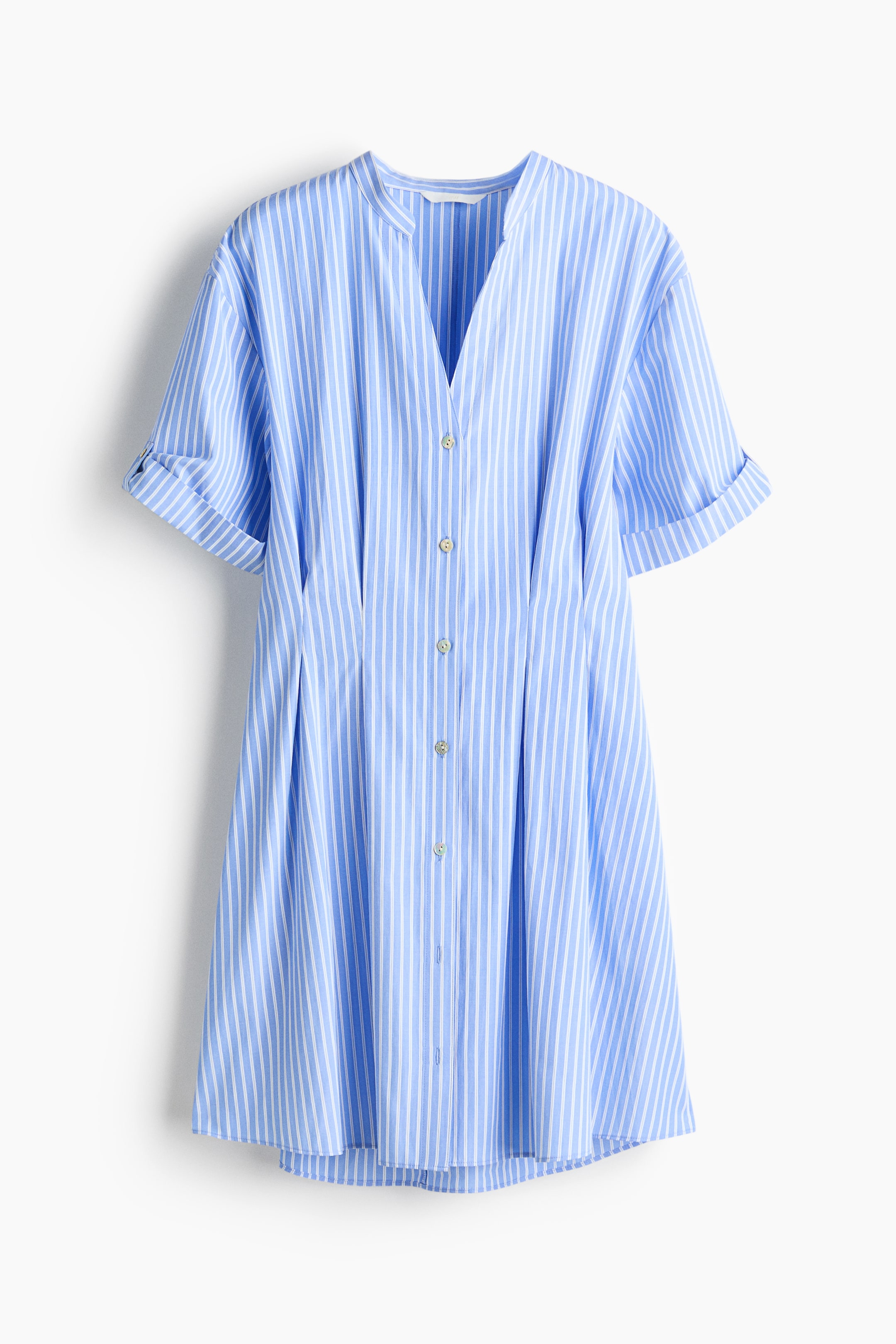 View larger image: A blue and white striped dress showcases a band collar with a V-neck opening and short, rolled-up sleeves. The front features a partial button placket with light-colored buttons, and pleats create an A-line shape from the chest down.