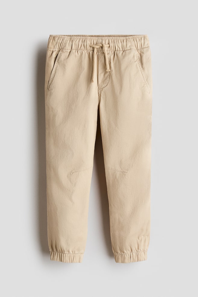 Joggers en sarga de algodón - Beige - 1