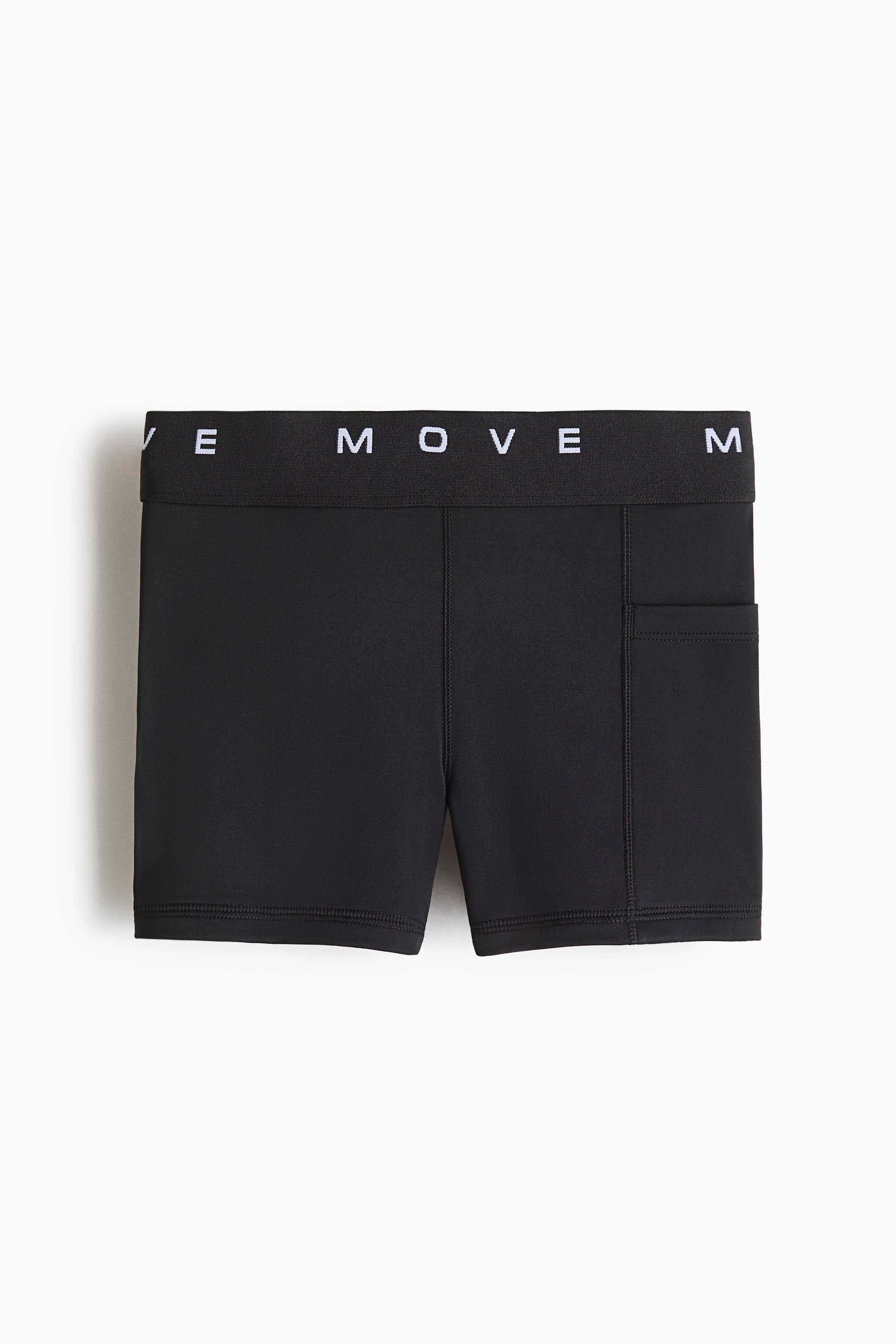 View larger image: A pair of black athletic shorts is facing front, featuring a black elastic waistband with "MOVE" text in white. A vertical slip pocket appears on the right leg.