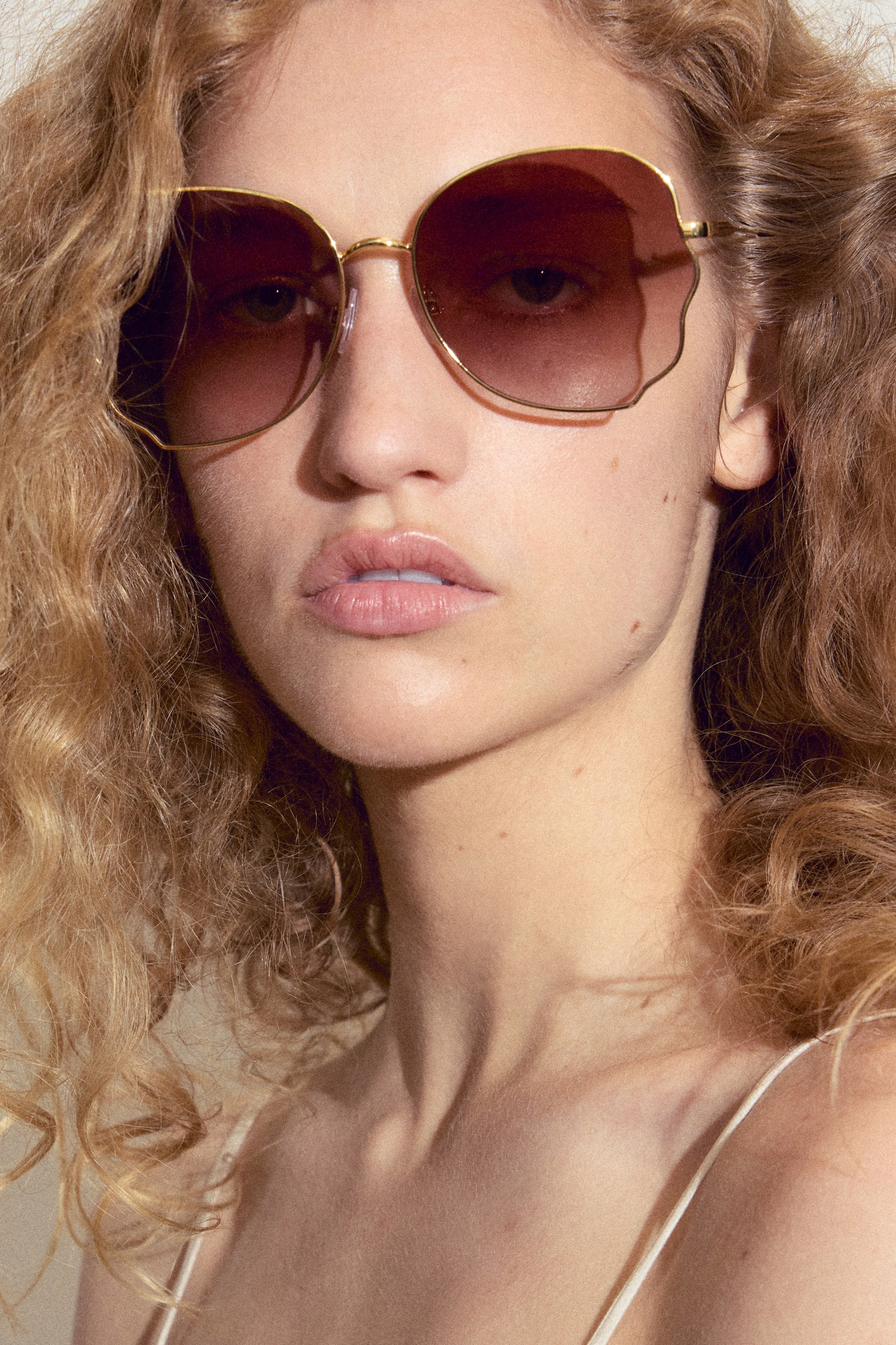 View larger image: Wavy-detail sunglasses - Gold-coloured - Ladies | H&M IE 1