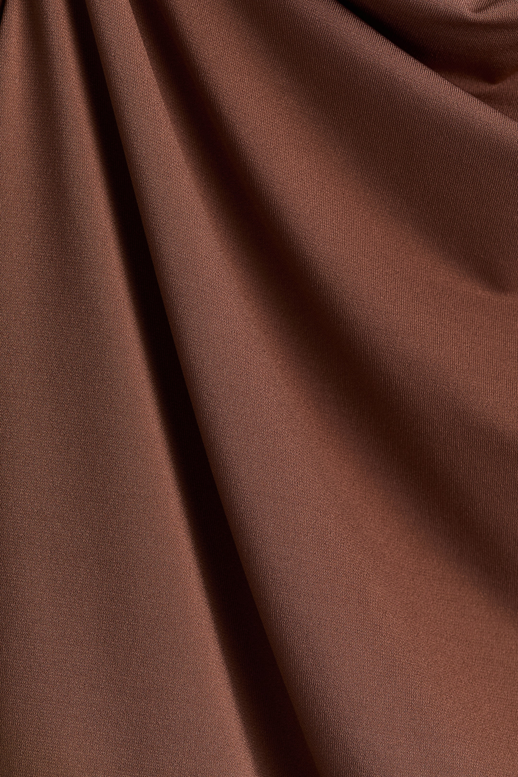Haut asymétrique à effet drapé