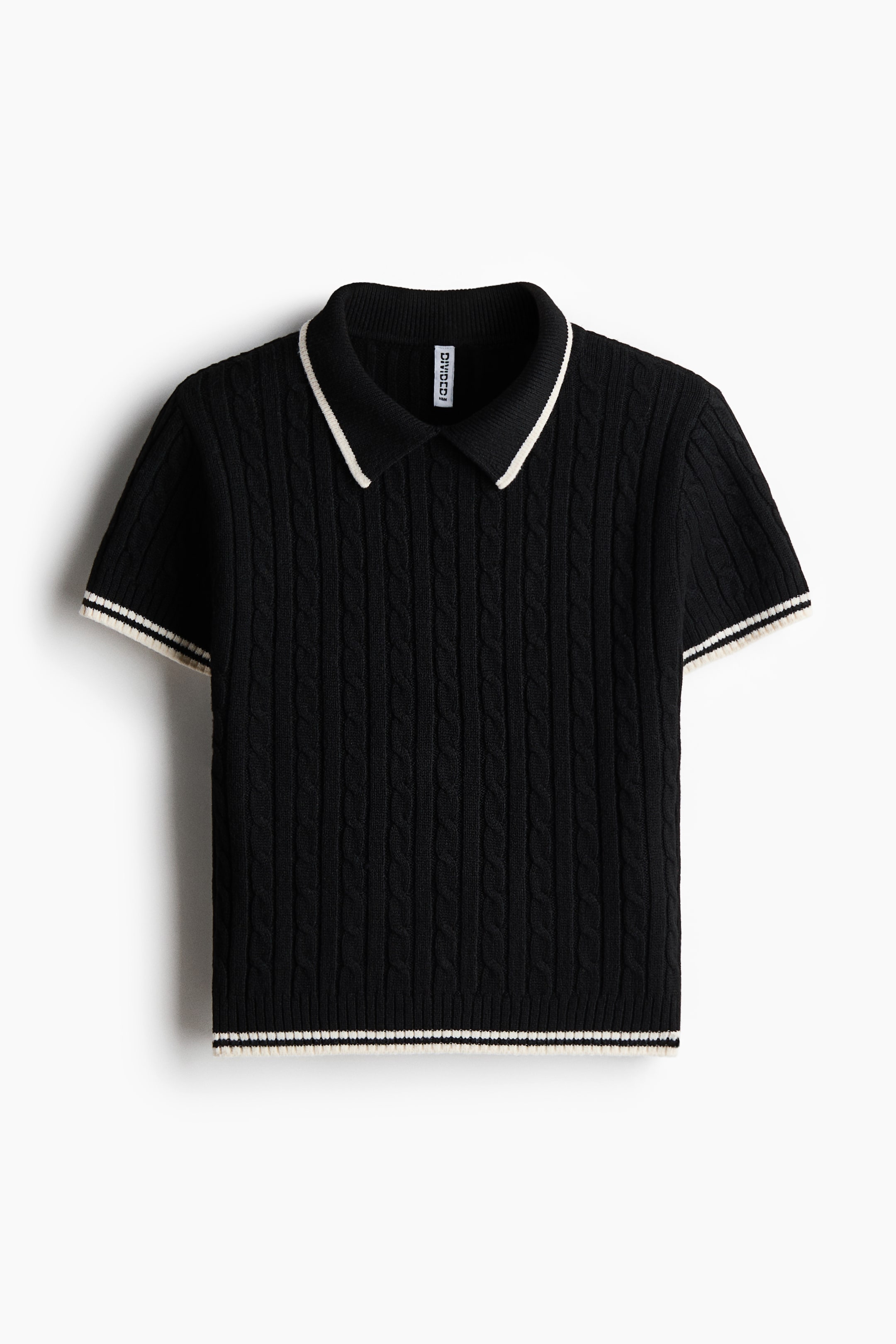 View larger image: A black, fitted short-sleeve top in a soft cable-knit fabric is presented from the front. It features a rib-knit collar with a white stripe, and ribbed cuffs and hem, each accented with white stripes.