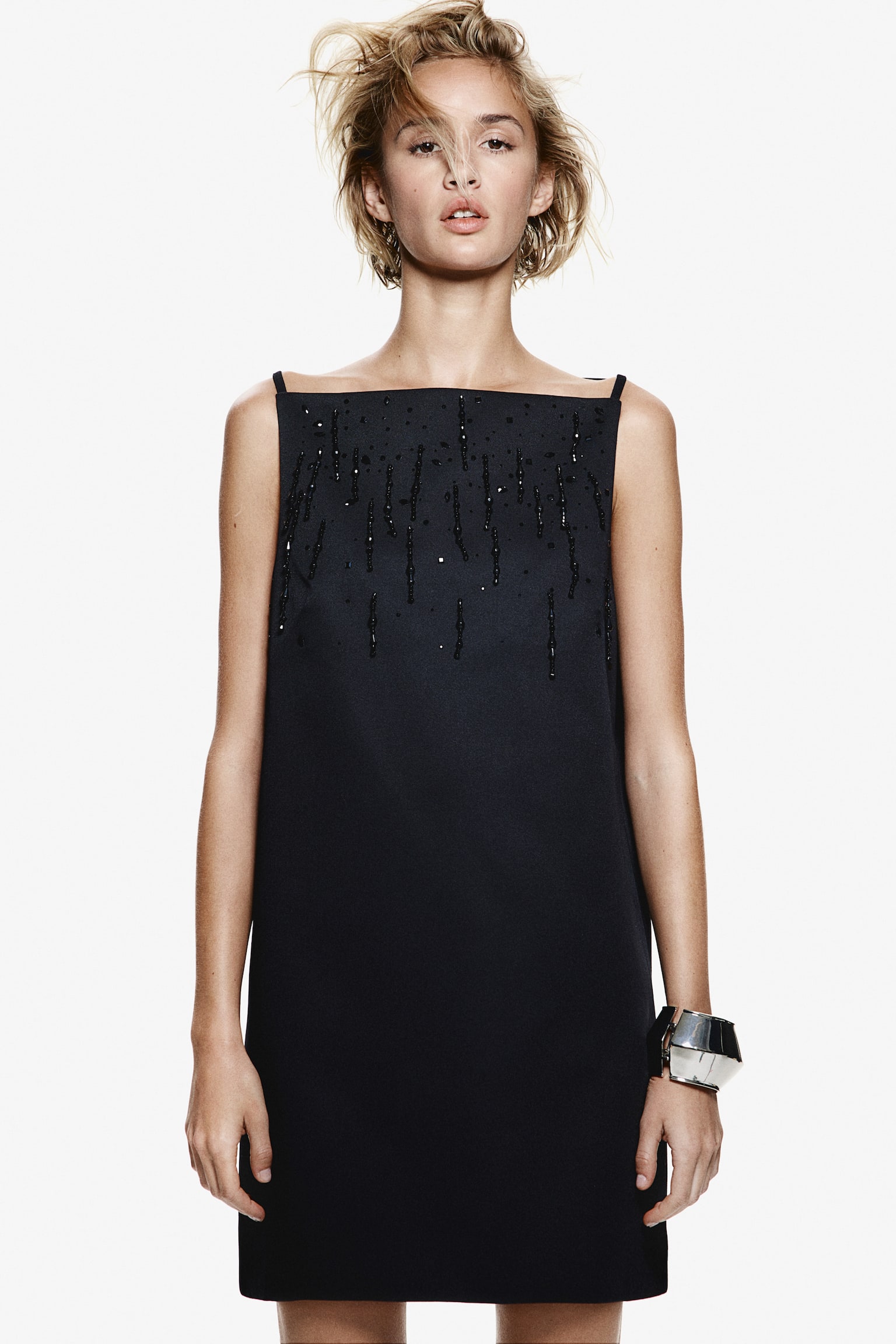 christmas party outfit trends 2024 - black H&M Embellished mini dress