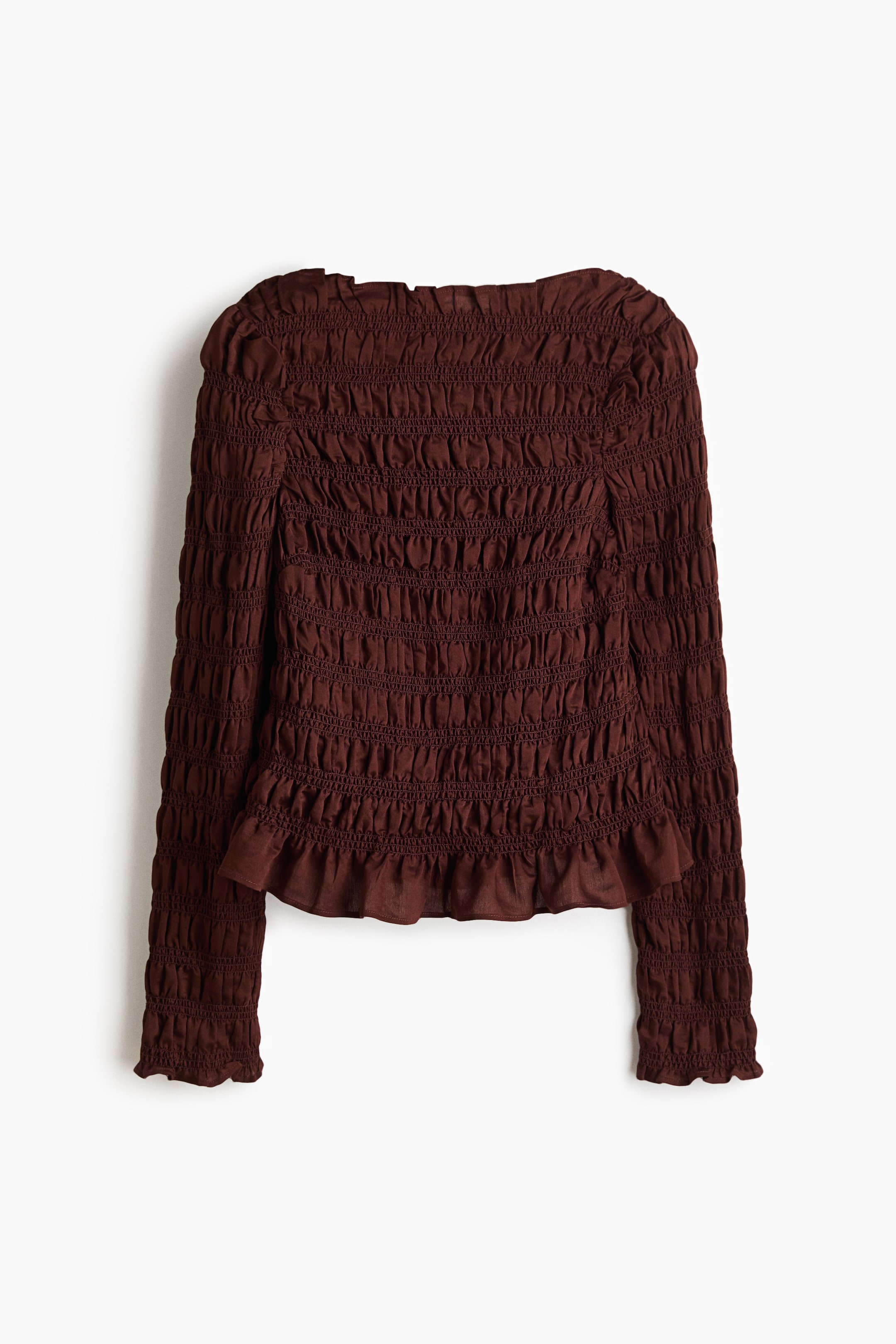 View larger image: A dark brown top is facing FRONT, featuring a fully shirred design across its body and long sleeves. It showcases a wide neckline and a ruffled peplum hem at the waist.