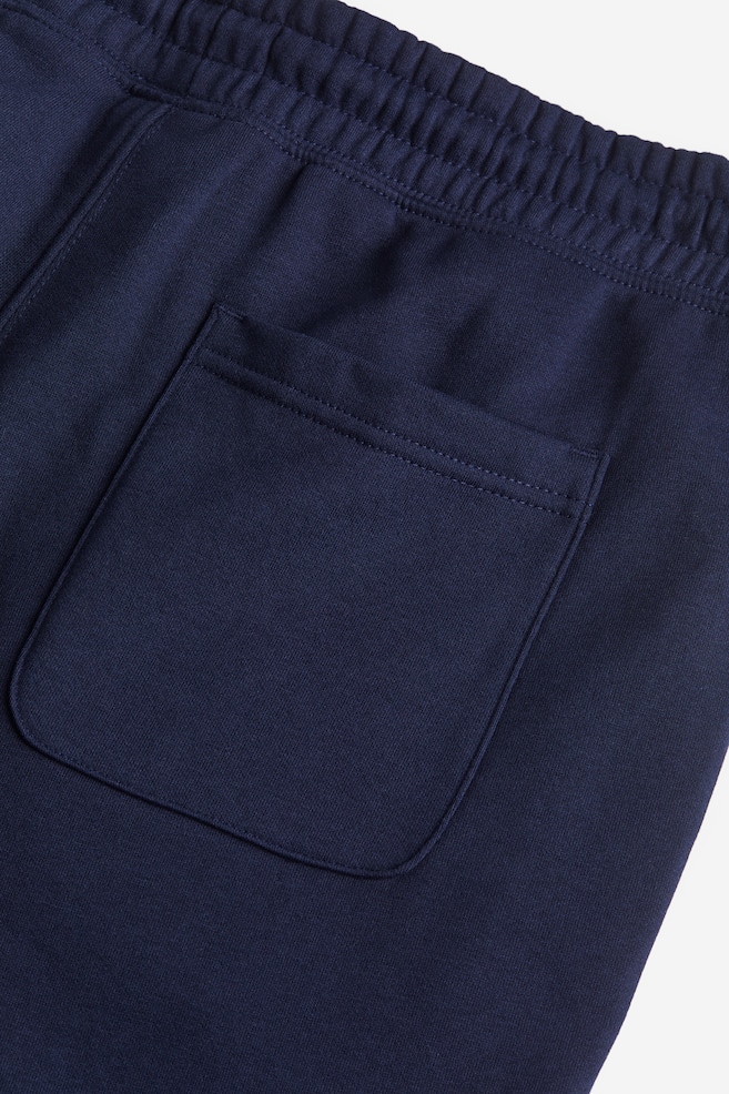 Pantaloni in felpa Relaxed Fit - Blu navy/Nero/Grigio mélange/Greige chiaro/dc - 5