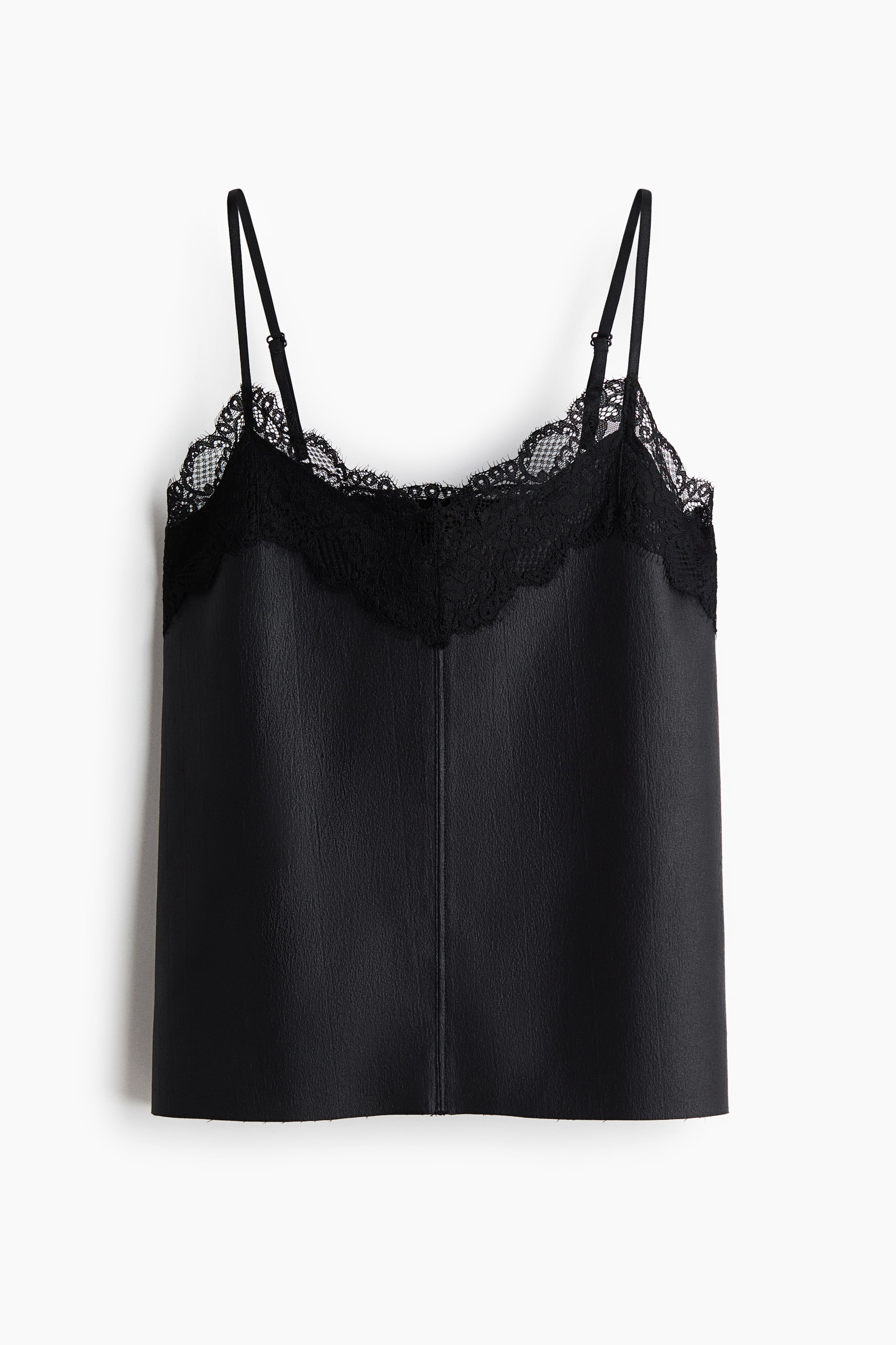 View larger image: A black camisole is shown front-facing with a matte faux-leather body. Black lace trim with a scalloped edge details the neckline; thin adjustable spaghetti straps are visible, and a vertical seam runs down the center front.
