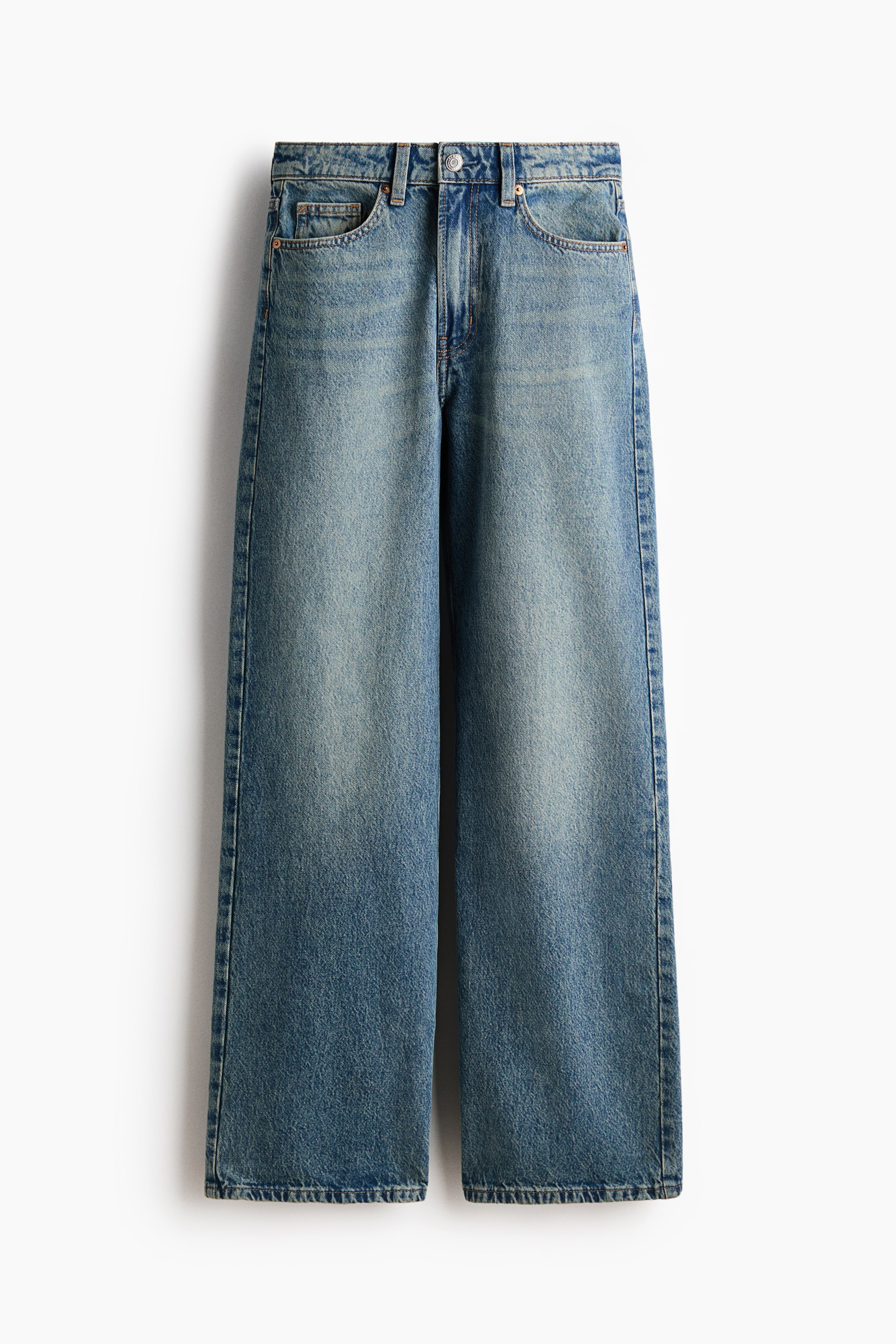 View larger image: FRONT view of faded blue 5-pocket jeans, featuring a high waist, zip fly with a button fastening, and a wide-leg cut from the thigh to the hem.