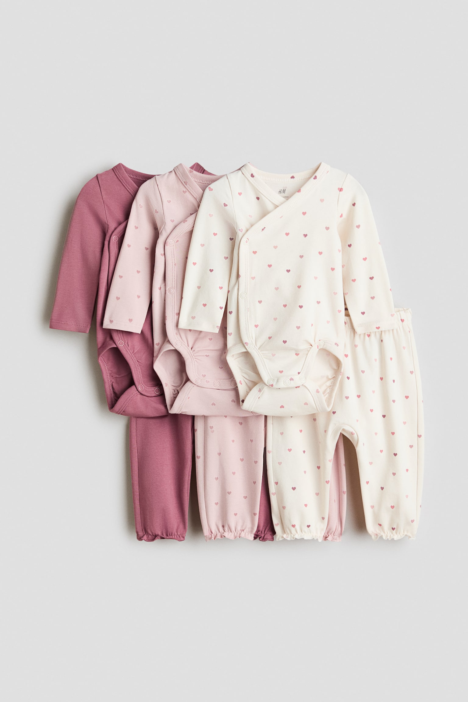 Set 6 pezzi body e pantaloni - Rosa/cuori/Verde chiaro/animali/Blu polvere/I'm New Here/Rosa polvere/fiori/Bianco/beige/Talpa/bianco/Rosa polvere/ciliegie