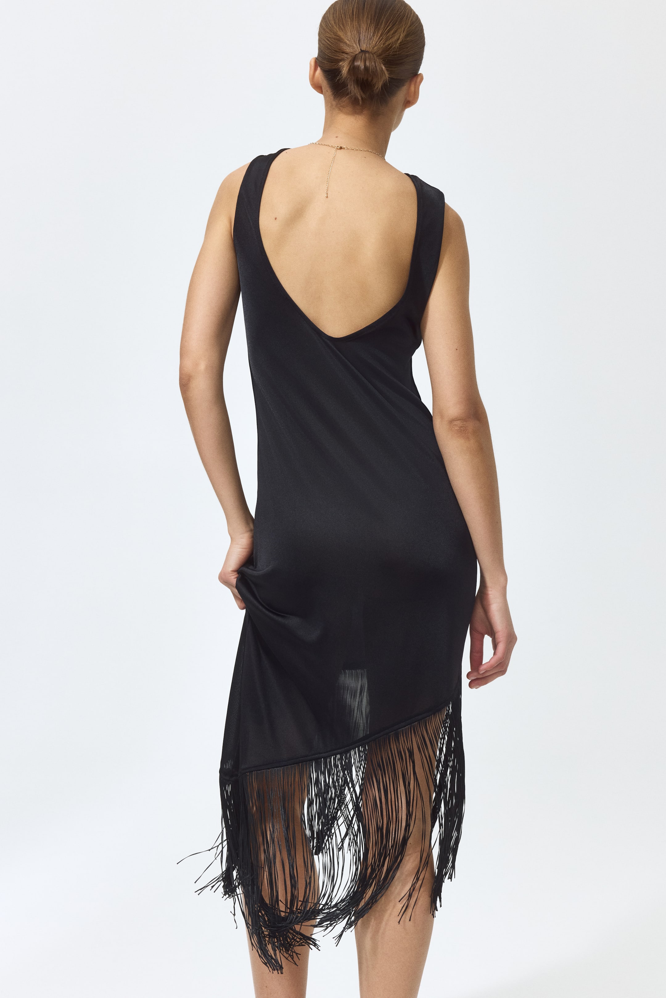 Robe asymétrique à franges