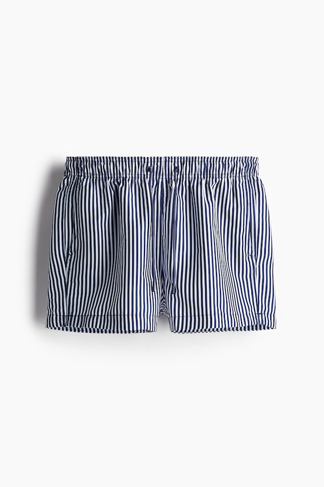 Gemusterte Badeshorts - Dunkelblau/Gestreift - 1