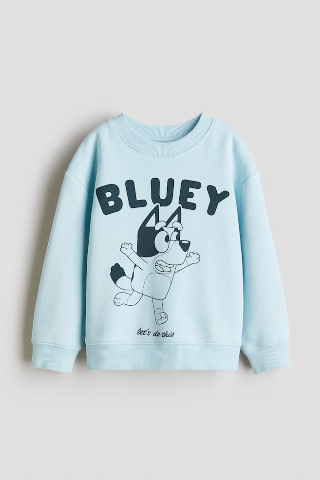 Bedrucktes Sweatshirt - Hellblau/Bluey/Cremefarben/Micky Maus/Mattblau/Sonic the Hedgehog/Dunkelgrau/Spider-Man - 1