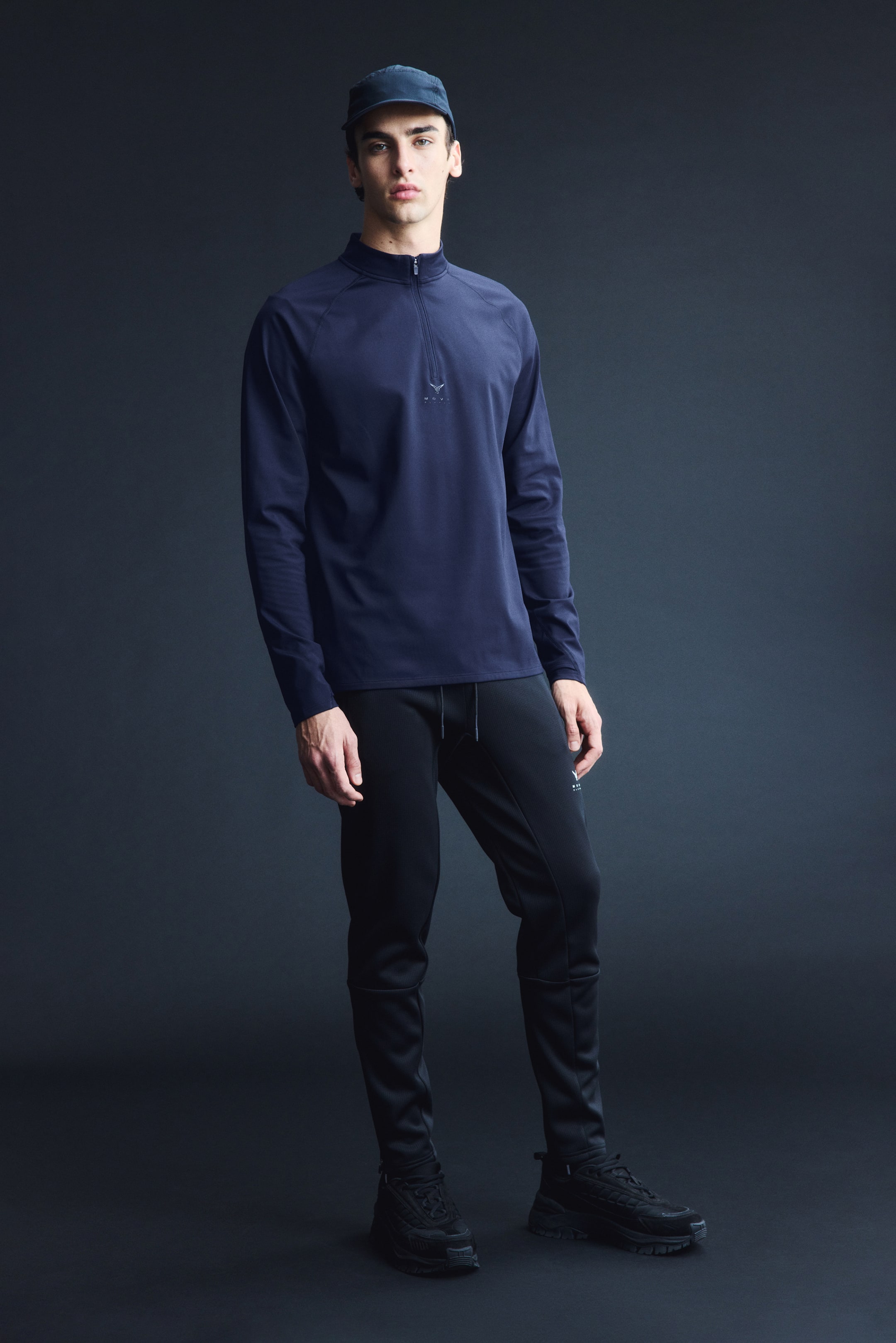 View larger image: Warming zip-top sports top with ThermoMove™ - Dark navy blue/Move Zlatan - Men | H&M IN 1
