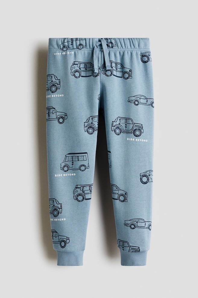 Pantalon jogger imprimé - Bleu/voitures/Vert/Miami/Noir/Beige/tigres/Turquoise ancien/Beige clair/dinosaures/Blanc/dinosaures/Bleu marine/rayé - 1