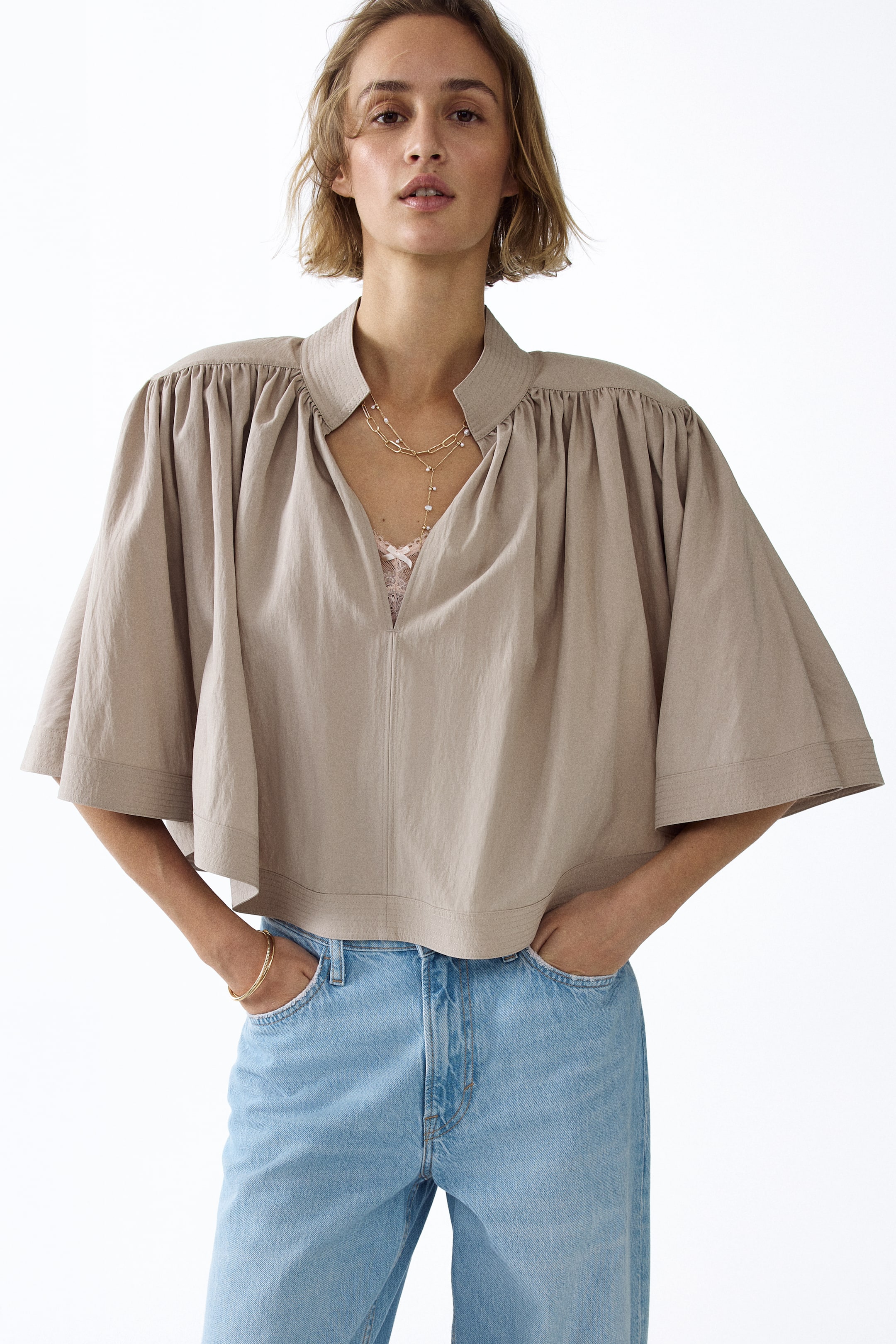 View larger image: Shoulder-pad cape blouse - Light dusty beige - Ladies | H&M GB 1