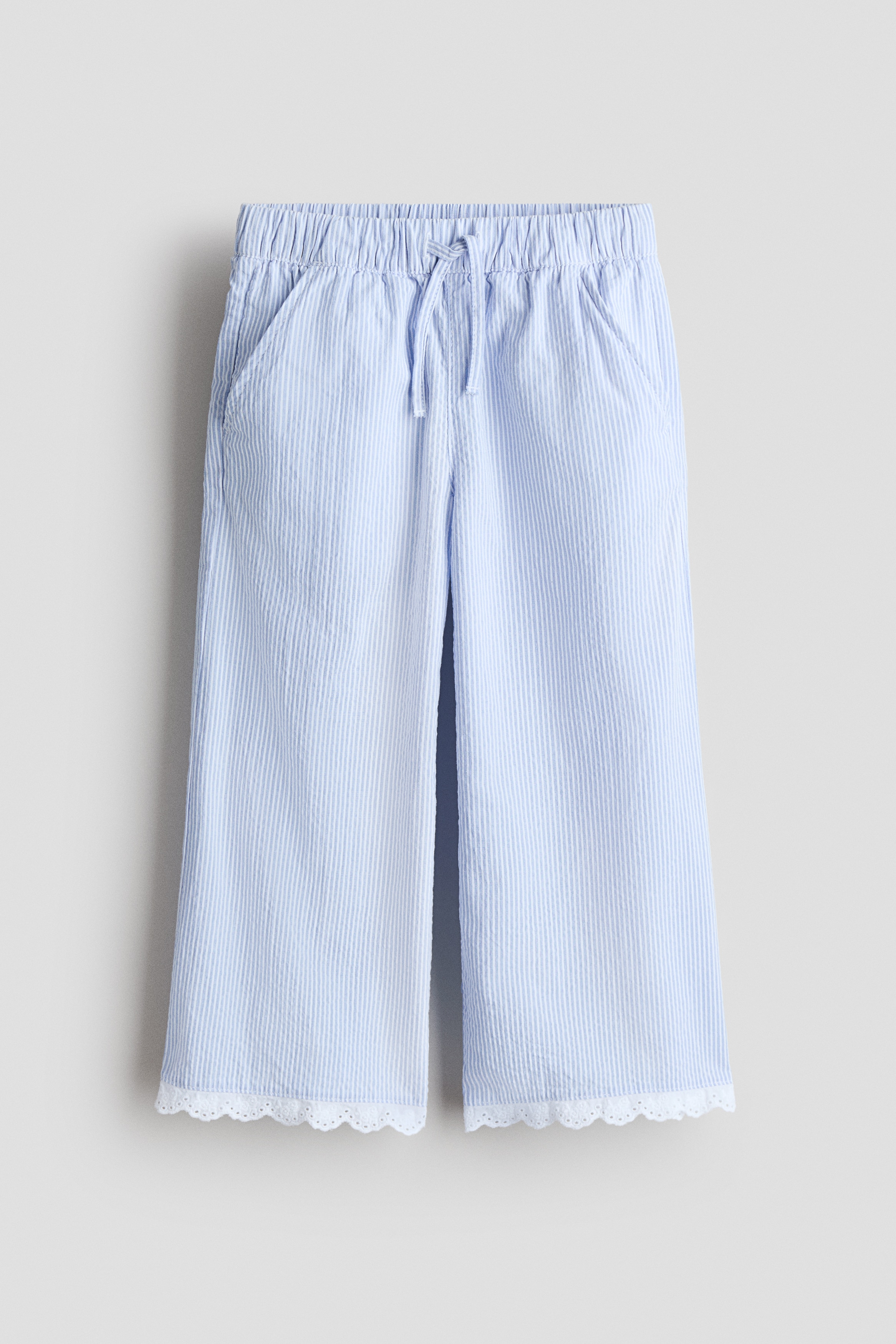 H. M Light blue/striped Lace-trimmed seersucker trousers for kids | H&M US