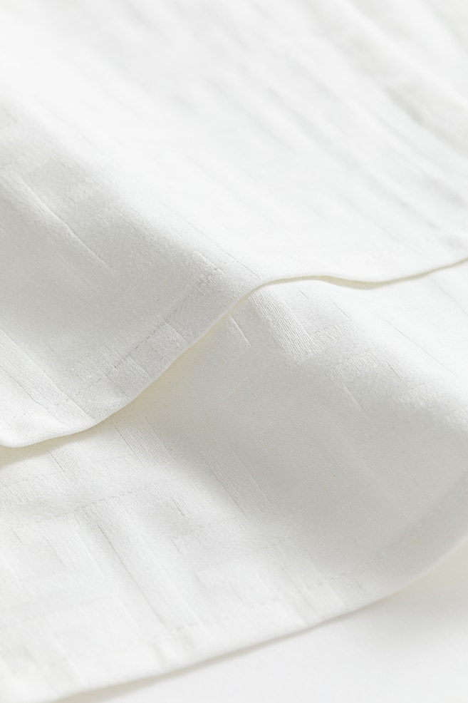 Lot de 2 serviettes de table tissées jacquard - Blanc/motif - 3