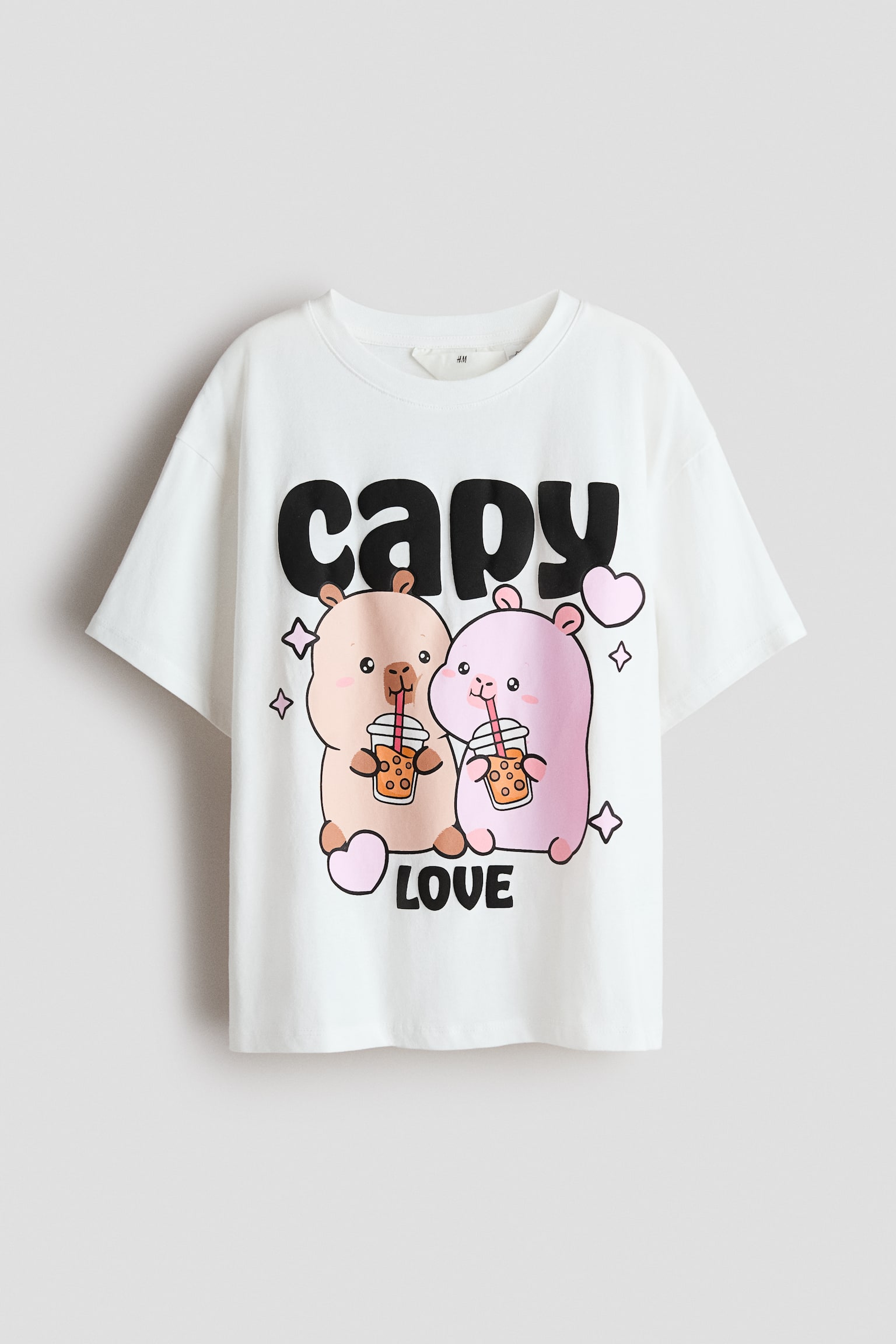 Pamučna majica sa aplikacijama - Bela/Capy Fun/Bela/Hello Kitty/Bela/Garfield/Svetloplava/Lilo i Stič/Ljubičasta/SmileyWorld®/Bela/Lilo i Stič/Svetloružičasta/Miki Maus/Tamnobež/SmileyWorld®/Ružičasta/Badtz-Maru/Svetložuta/SmileyWorld®/Svetloružičasta/Mifi/Svetloružičasta/My Melody/Crvena/Helo Kiti/Svetloružičasta/Chupa Chups/Bela/Miki Maus/Bela/Maj Melodi