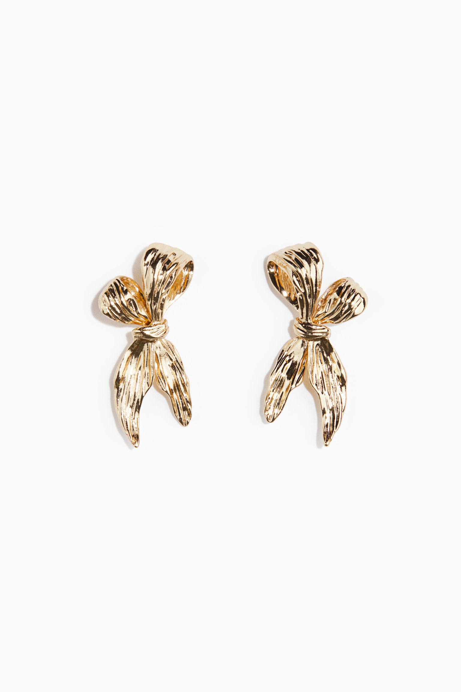 Bow-shaped earrings - Gold-coloured