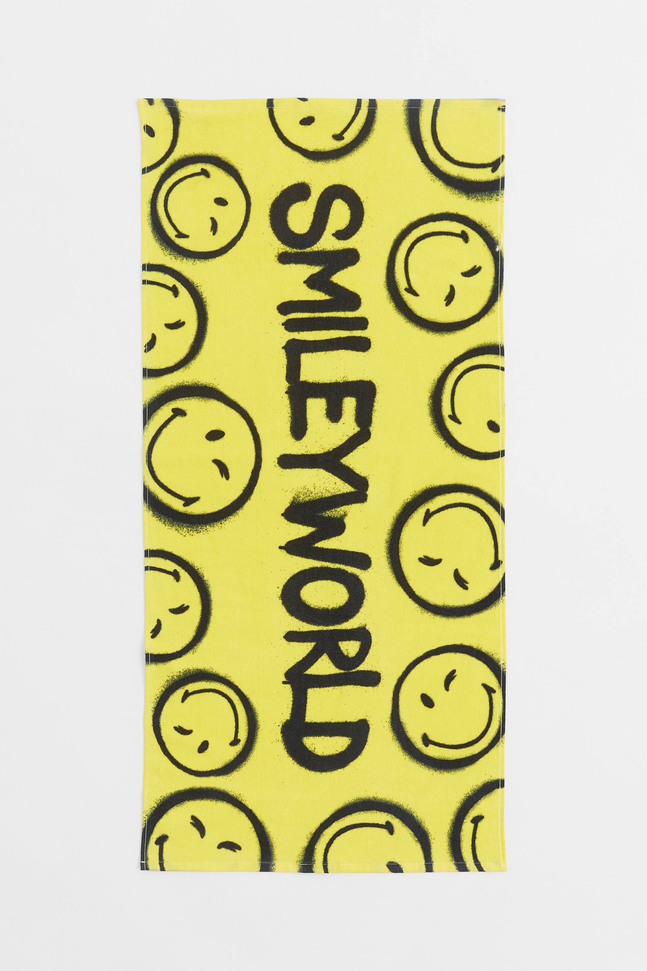View larger image: Patterned beach towel - Yellow/SmileyWorld® - Kids | H&M 1
