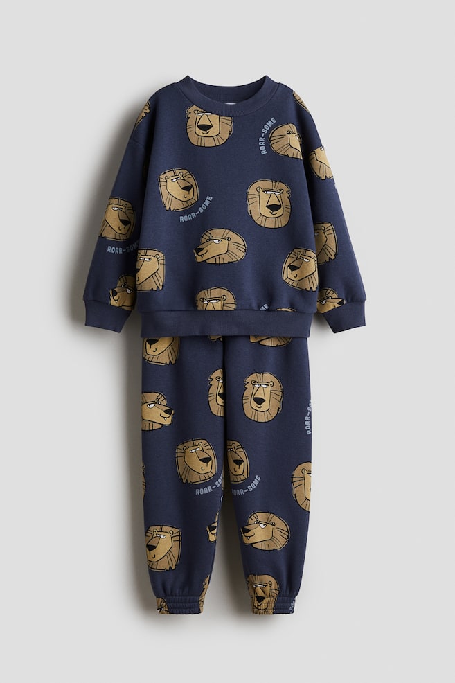 2-Piece Printed Sweatsuit - Dark blue/lions/Light gray/dinosaurs/Green/Patterned - 1