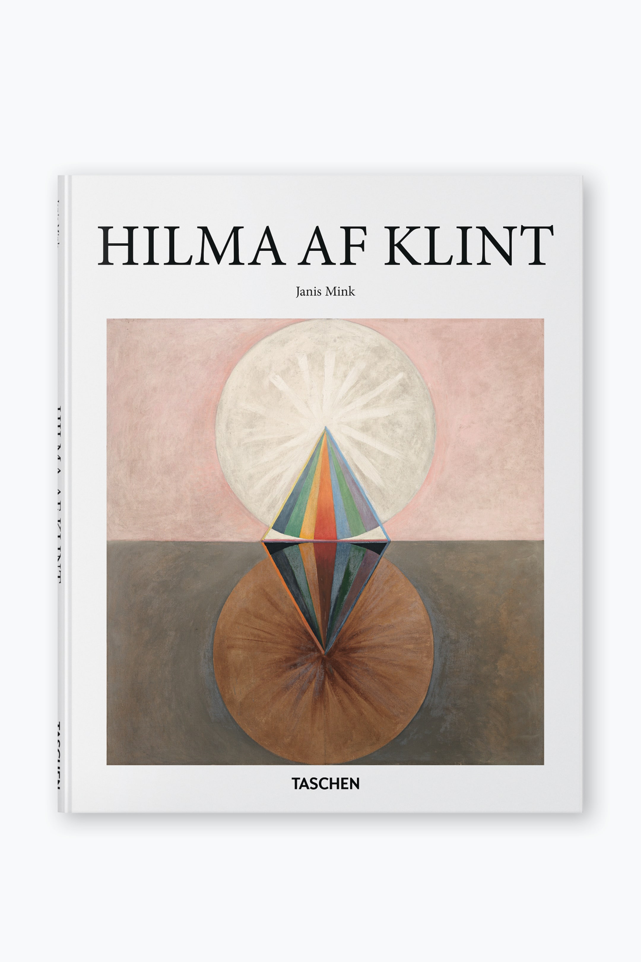 Vis større bilde: En bok er plassert i en svak vinkel, som viser forsiden og en del av ryggen. Den hvite forsiden viser "HILMA AF KLINT" og "Janis Mink" i svart tekst, et abstrakt maleri med en flerfarget diamantform mellom en hvit sirkel på en lys rosa bakgrunn og en brun sirkel på en mørk gråbrun bakgrunn, og "TASCHEN" i svart tekst nederst. Den synlige ryggen viser vertikalt "HILMA AF KLINT".