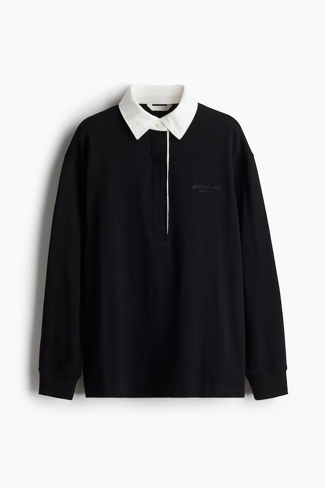 Poloshirt mit Stickerei - Schwarz - 1