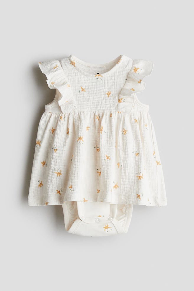 Bodykleid mit Volants - Cremefarben/Geblümt/Rosa/Geblümt/Weiß/Geblümt/Hellblau/Geblümt/Weiß/Hellgelb - 1