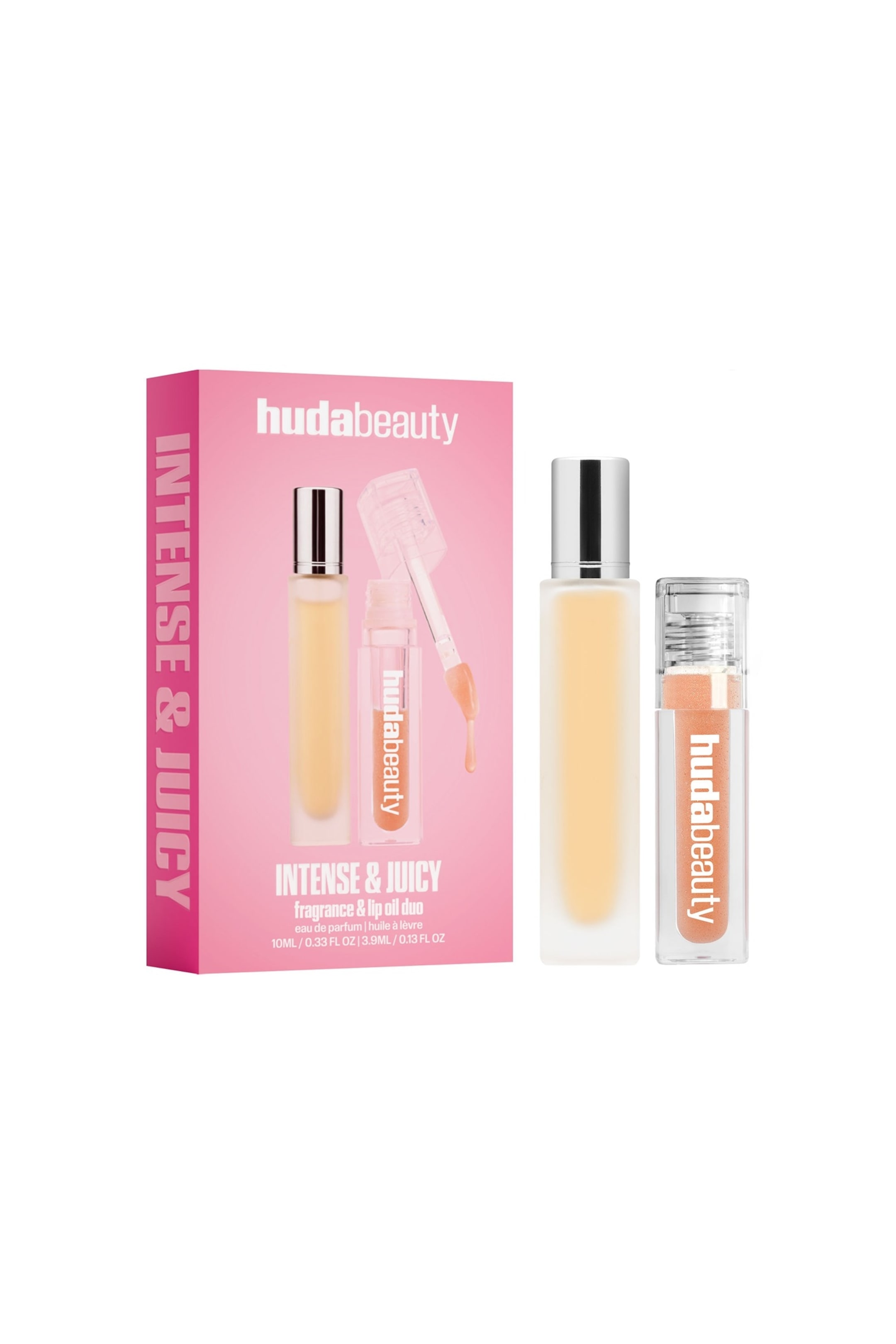 Visa större bild: Huda Beauty Intense & Juicy Fragrance & Lip Oil Duo visas i en rosa, rektangulär förpackningsask vinklad åt vänster, med innehållet uppställt bredvid i upprätt position. En hög, smal parfymflaska i frostat glas med metallisk silverkork visas, medan en kortare, genomskinlig rektangulär lip oil-tub visar en persikofärgad produkt med vit vertikal varumärkestext.