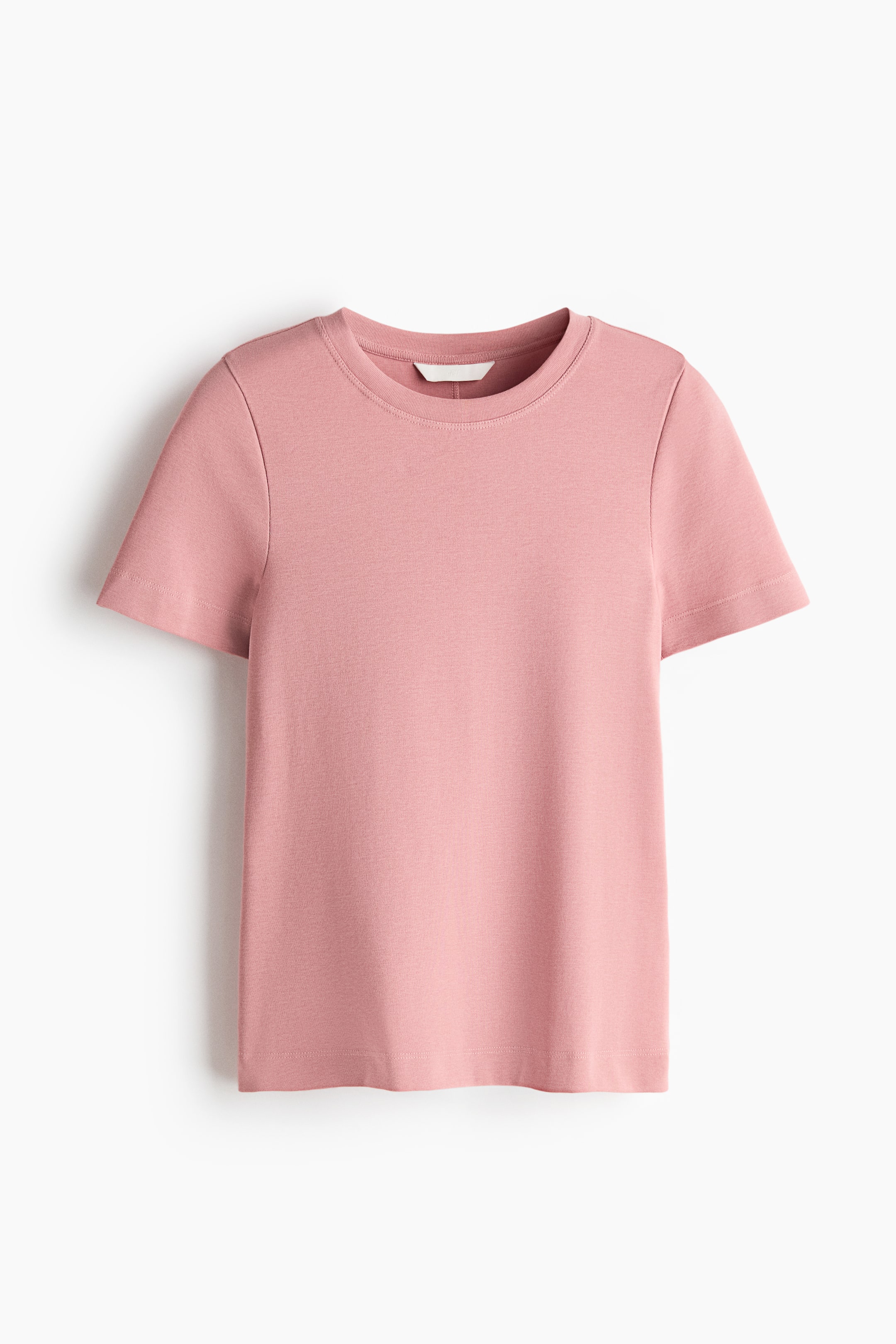 Voir une image plus grande: Un t-shirt rose ajusté en jersey de coton doux est présenté de face, avec un col rond, des manches courtes et un ourlet droit.