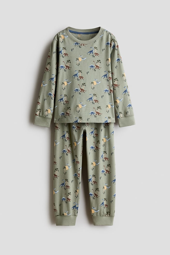 Pijama estampado de algodón - Verde empolvado/Dinosaurios/Crema/Vehículos/Crema/Estegosaurios/Azul marino/Galaxy travels/Azul marino/Cohetes/Azul claro/Tractores - 1