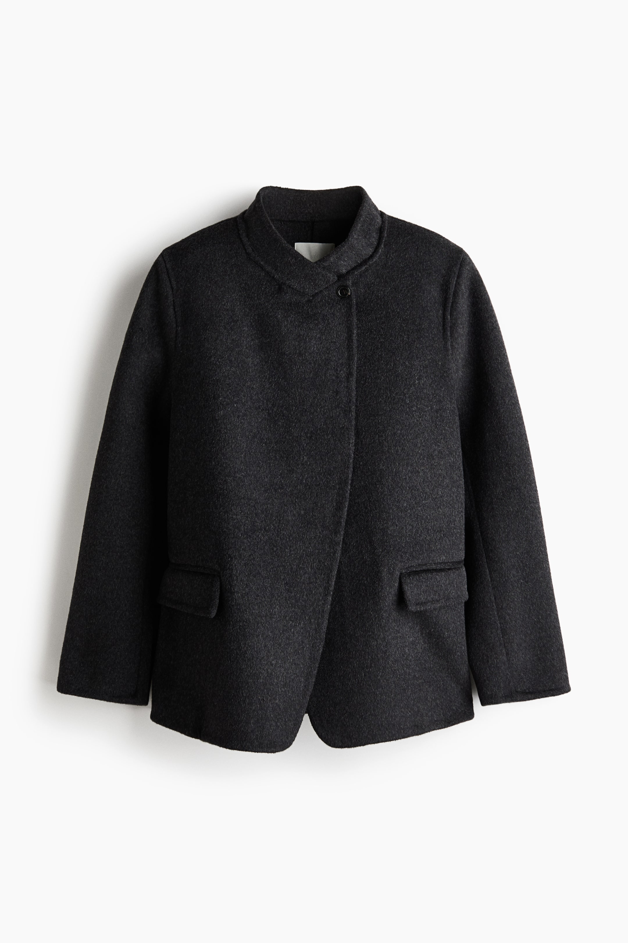 View larger image: A front-facing dark grey, felted wool-blend blazer features a stand collar, structured shoulders, and a slightly offset front closure with a single visible button near the neckline. The blazer also has long sleeves and two jetted front pockets with flaps.