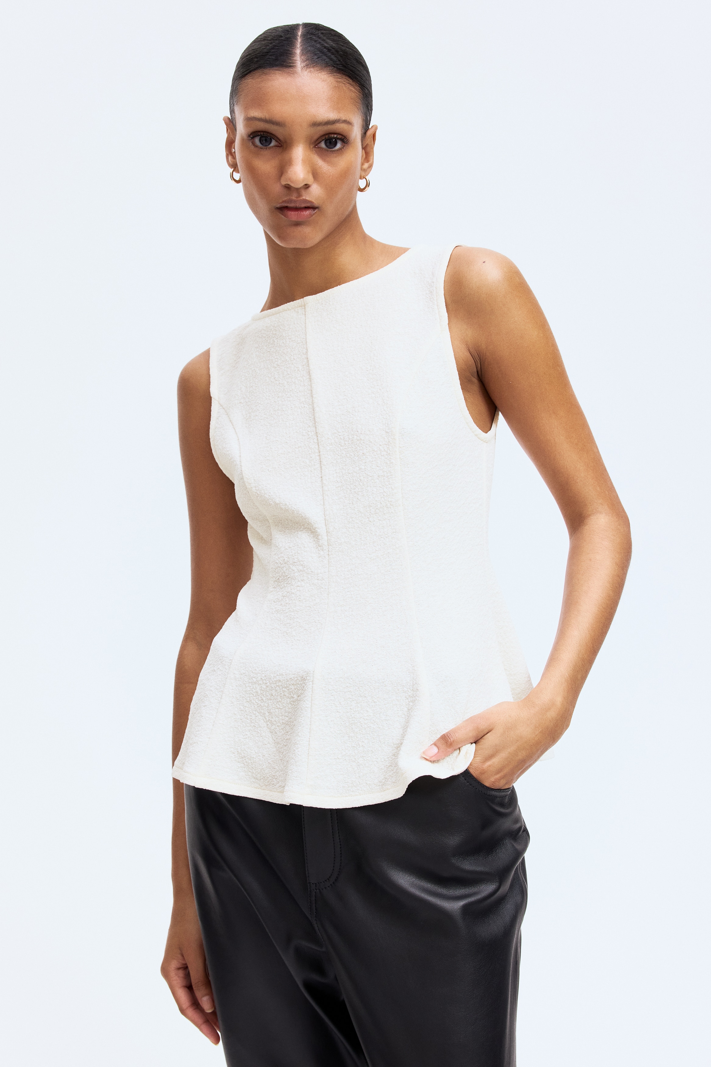 Sleeveless peplum top