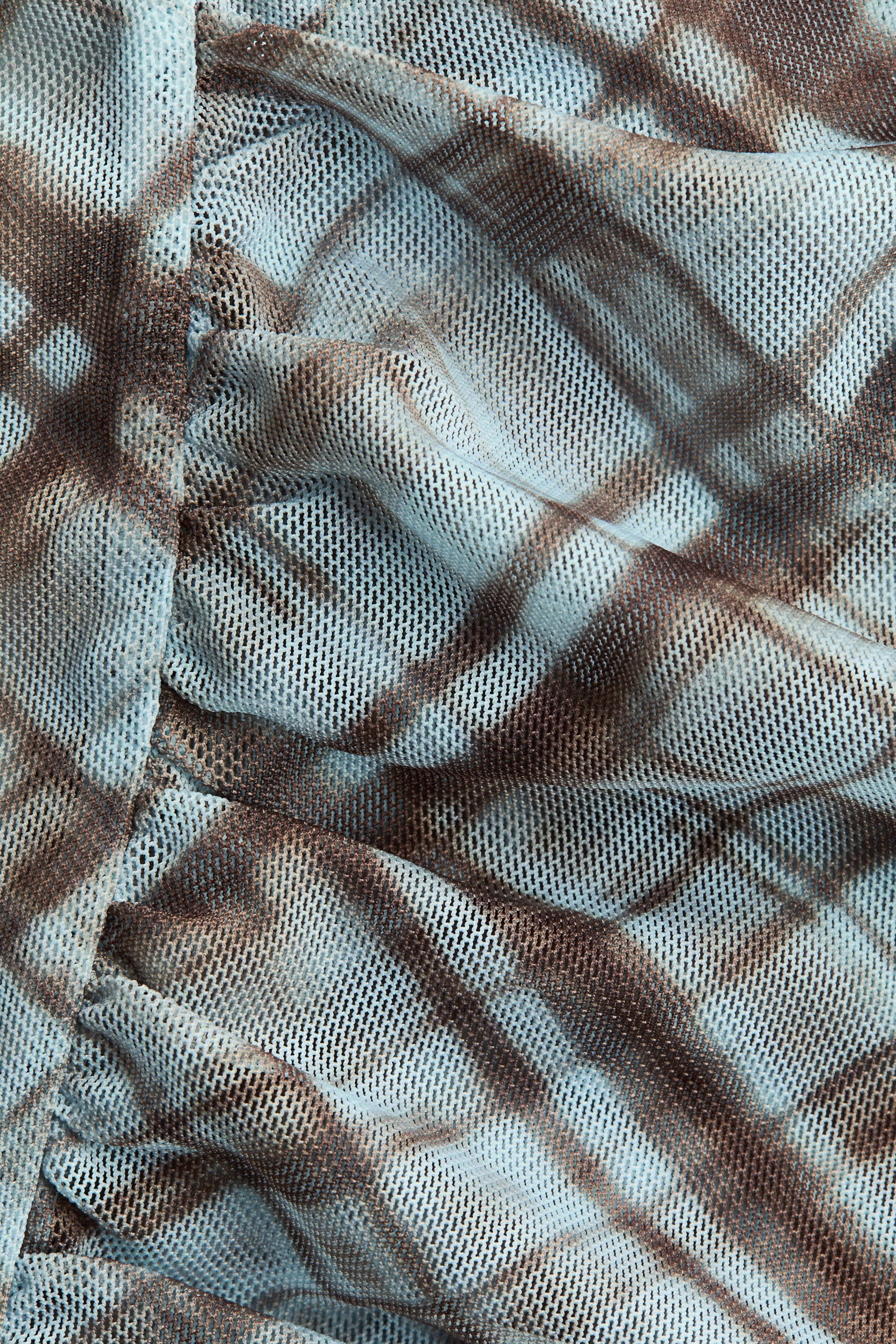 Asymmetric Mesh Top