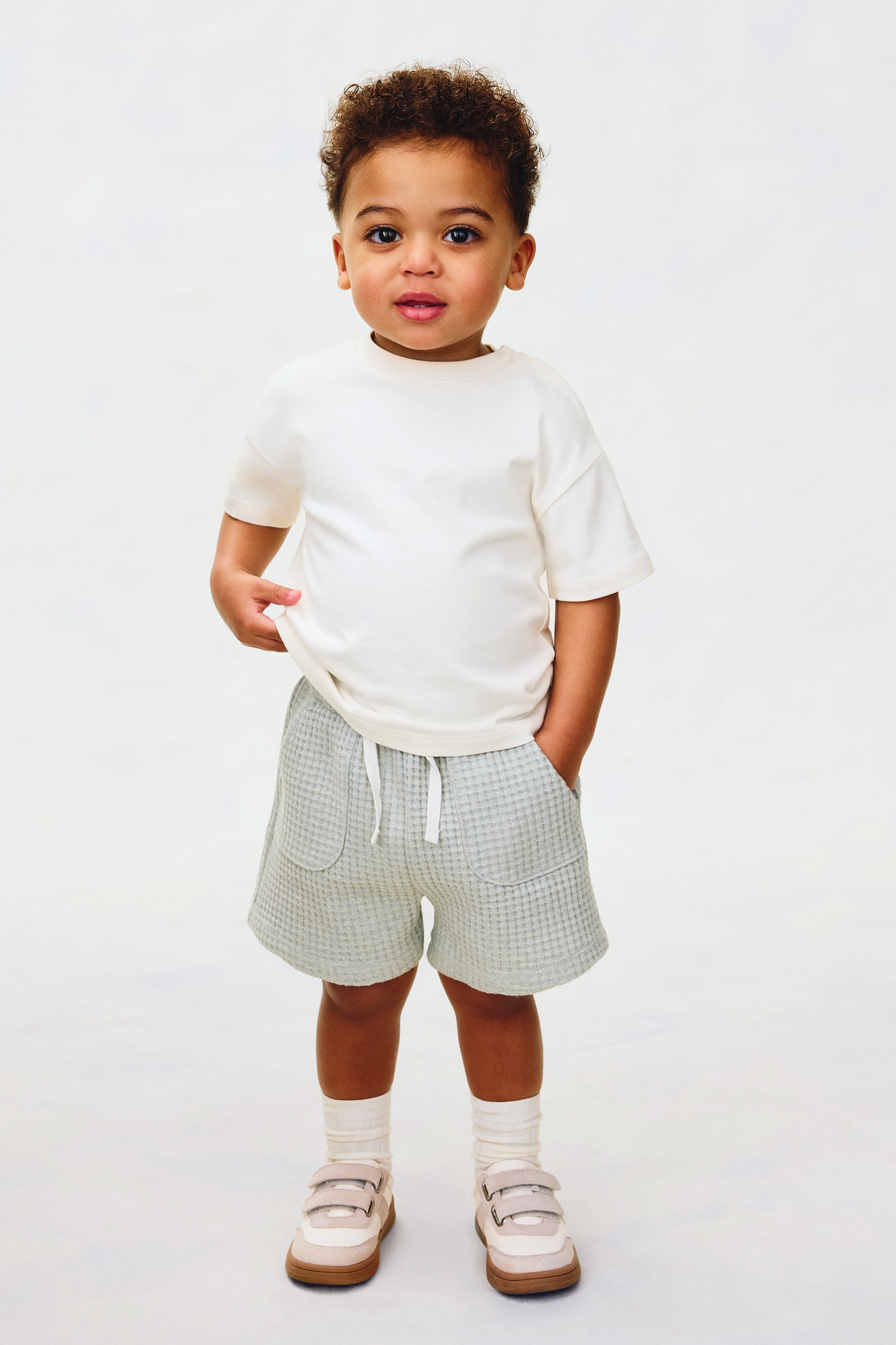 T-shirt ampia in cotone pima - Bianco/Blu polvere chiaro/Rosa polvere chiaro/Nero