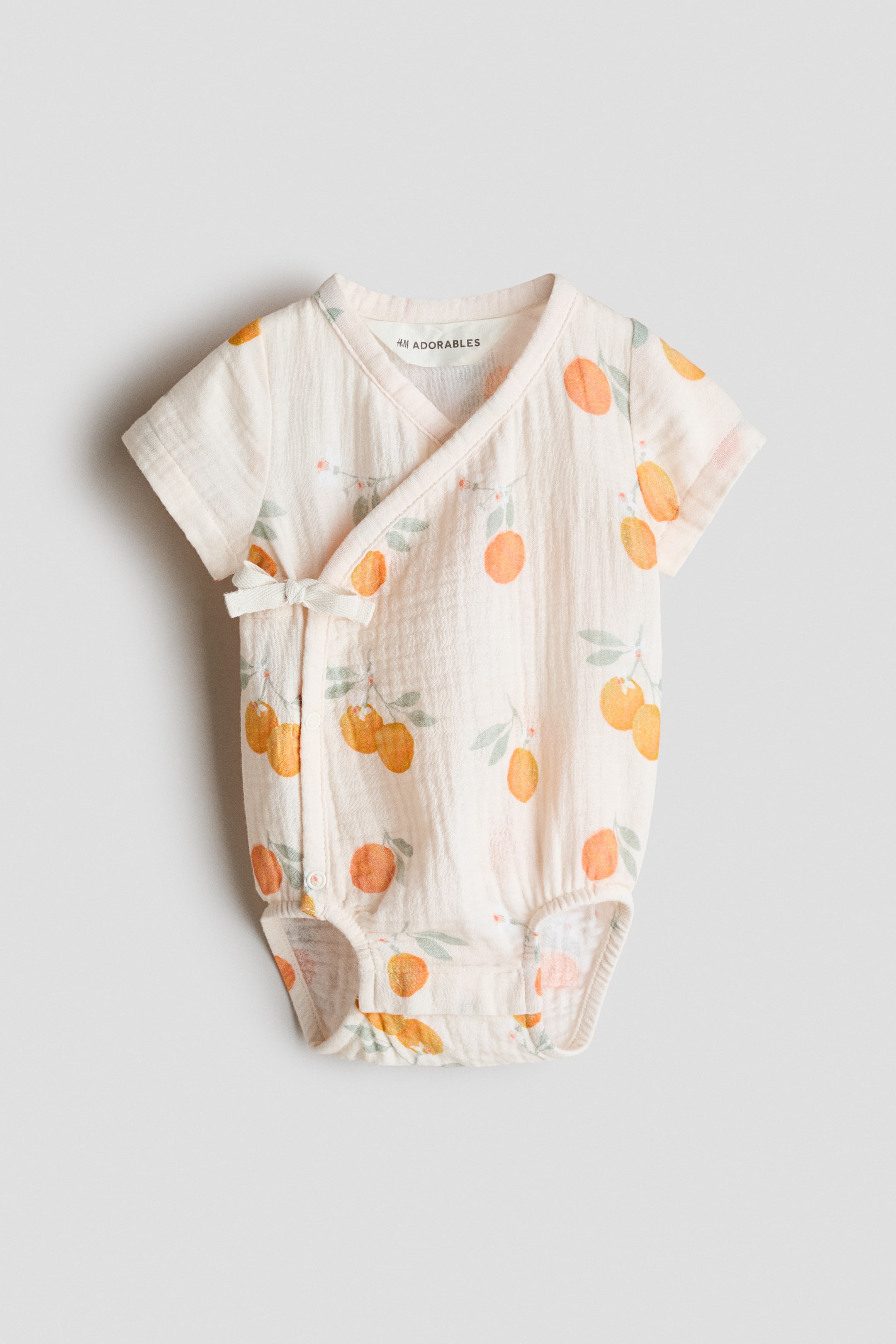 Voir une image plus grande: Cache-couche en mousseline de coton - Crème/citrons - Kids | H&M CA 1