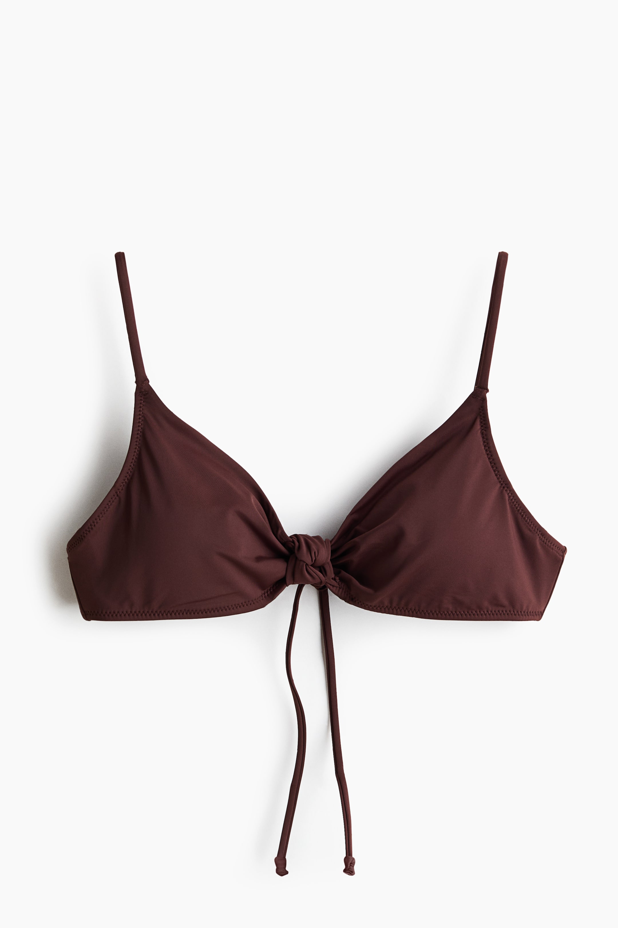 View larger image: The front-facing dark brown bikini top showcases triangular cups and slender shoulder straps. A knot gathers the fabric at the center of the bust, with two tie strings elegantly draping downwards.