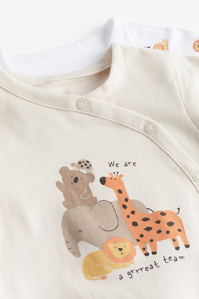 Lot de 2 pyjamas à motif en coton - Beige/girafe/Blanc/dinosaures/Rouge/coccinelle/Bleu foncé/motif - 2