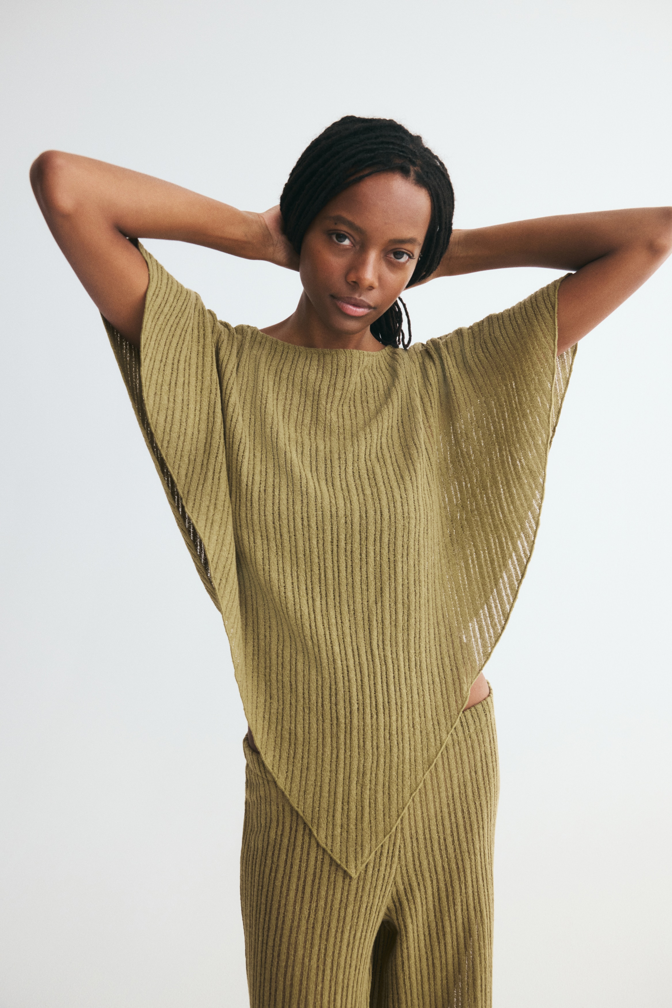 Mantella in maglia a costeModal