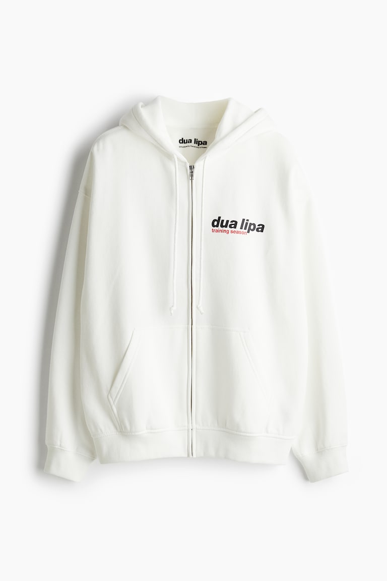 Oversized printed zip-through hoodie - Cream/Dua Lipa - Ladies | H&M