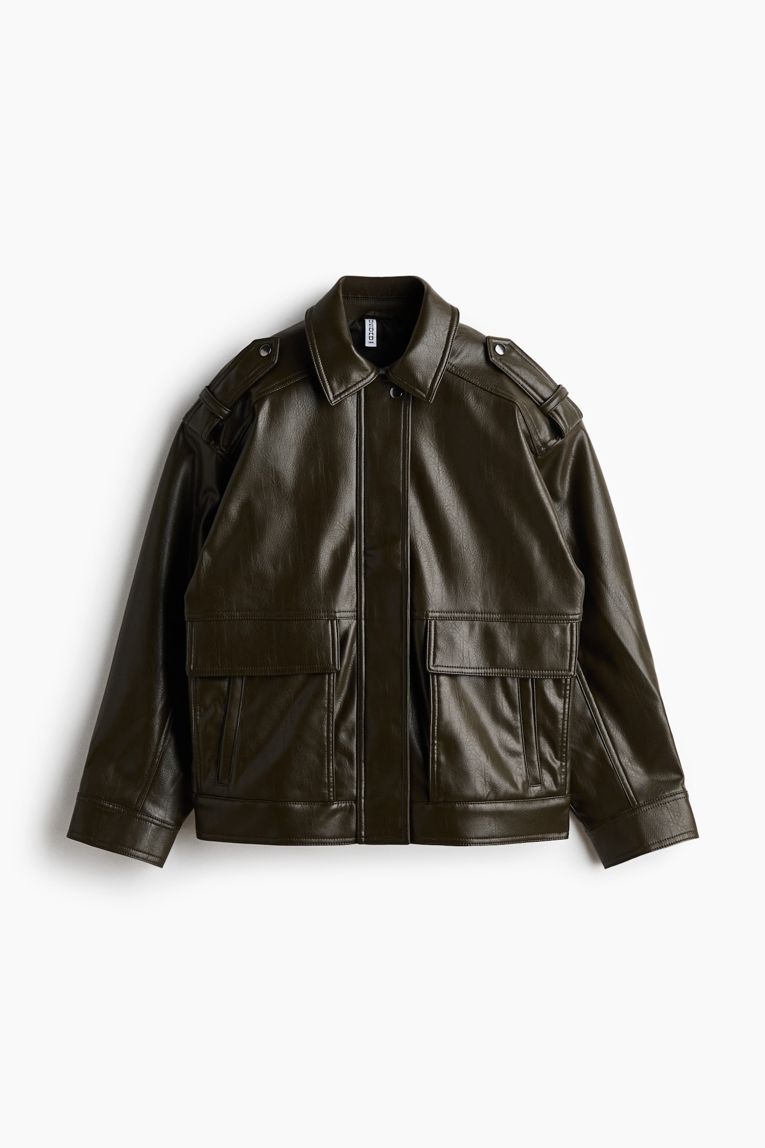 A dark green faux leather jacket is showcasing its front, featuring a pointed collar and epaulettes with snap fastenings on the shoulders. Two large flap pockets with pleats are visible on the chest, and the jacket displays a textured finish with a concealed front placket. - 1