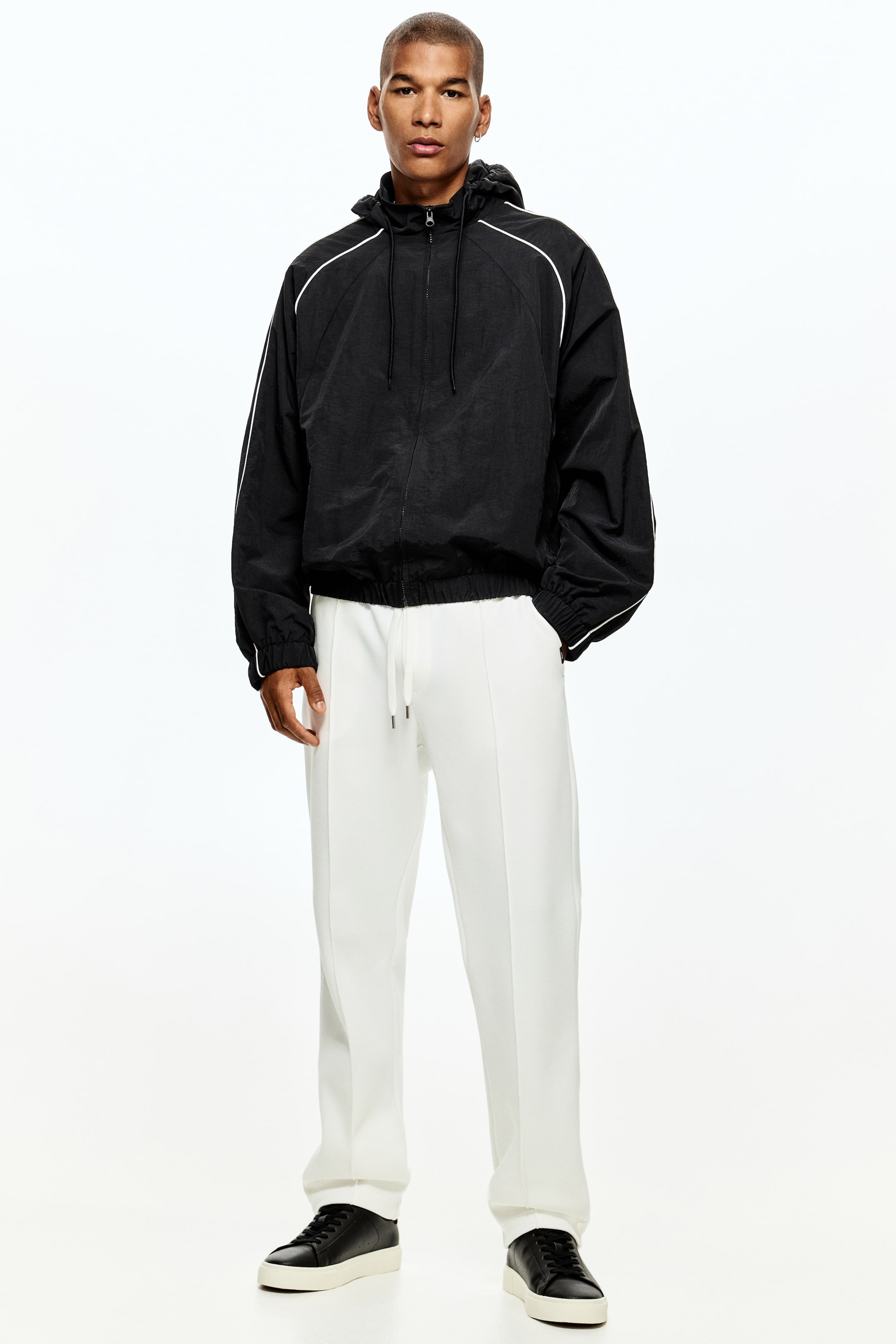 Xem ảnh lớn hơn: Quần jogger kiểu may đo Regular Fit - Màu trắng - Men | H&M VN 1