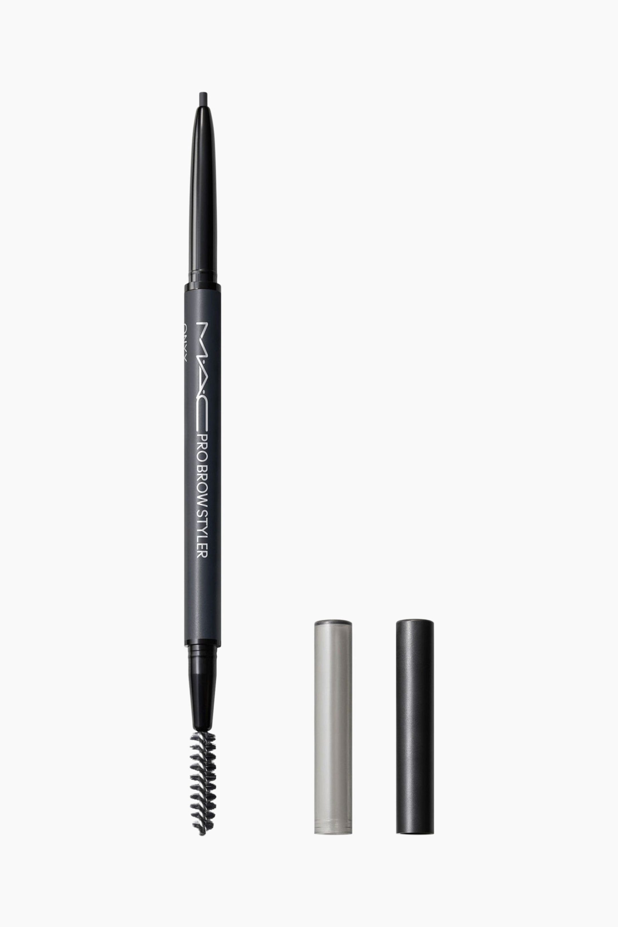 Visa större bild: Pro Brow Styler Fill & Shade Brow Pencil står vertikalt och visar en dubbeländad design med en fin, indragbar pennspets i ena änden och en spoolie-borste i den andra. Två lösa cylindriska korkar, en i ljusgrått och en i mörkgrått, står upprätt bredvid pennan.