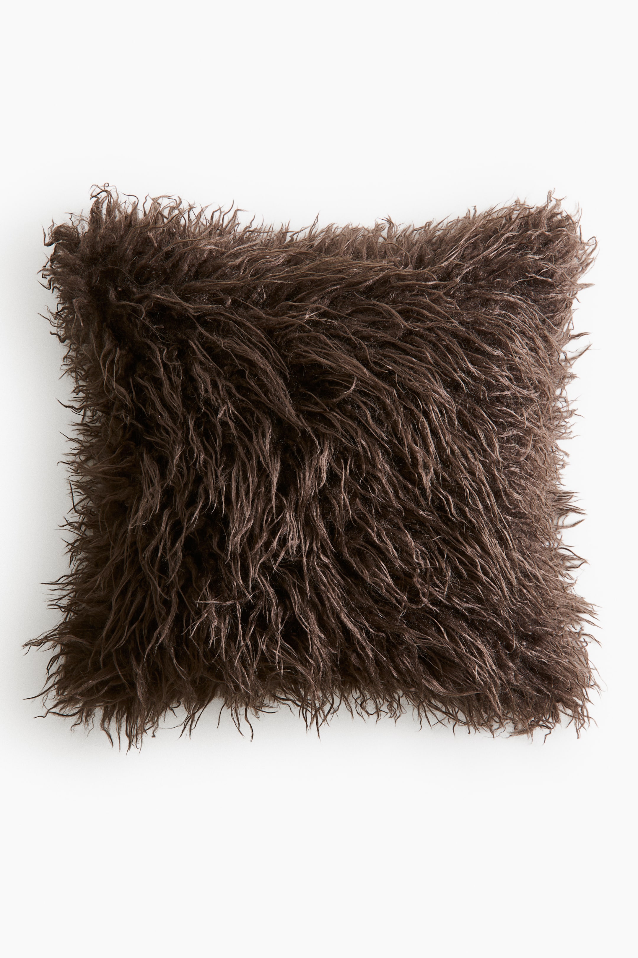View larger image: A dark brown square cushion is facing forward, showing its entire surface covered in shaggy, long-pile faux fur.