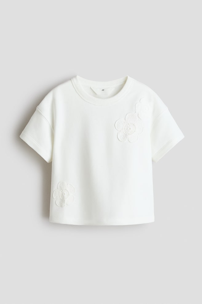 Camiseta con motivo decorativo - Crema/Flores/Gris claro jaspeado/Cuentas/Gris oscuro/Lazo - 1
