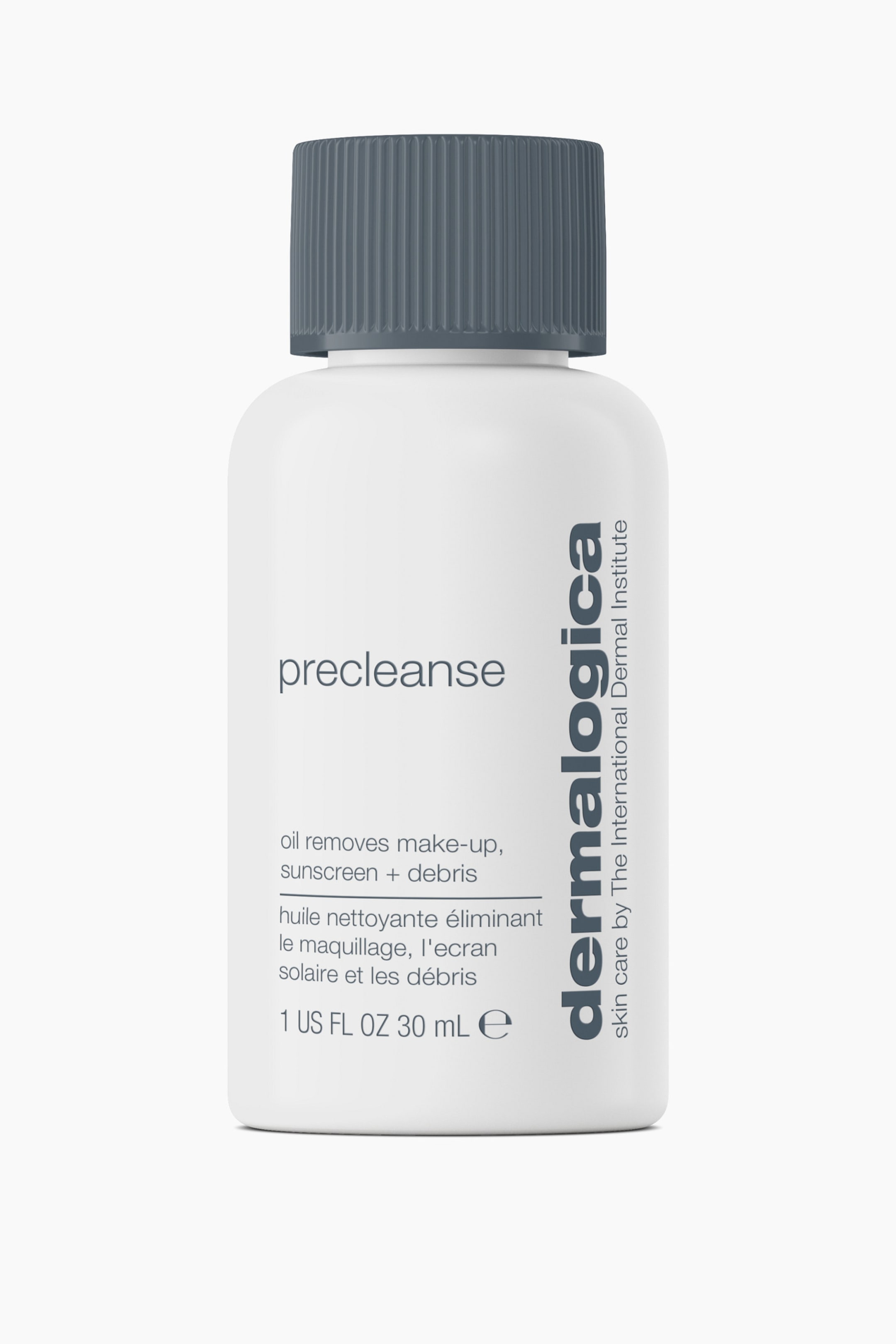 Visa större bild: En vit, cylindrisk flaska med Dermalogica Precleanse står upprätt och visar ett mörkgrått, räfflat skruvlock. Främre etiketten visar produktnamnet ”precleanse” i gemener, tillsammans med det vertikalt tryckta varumärkesnamnet ”dermalogica” och produktinformation på engelska och franska.