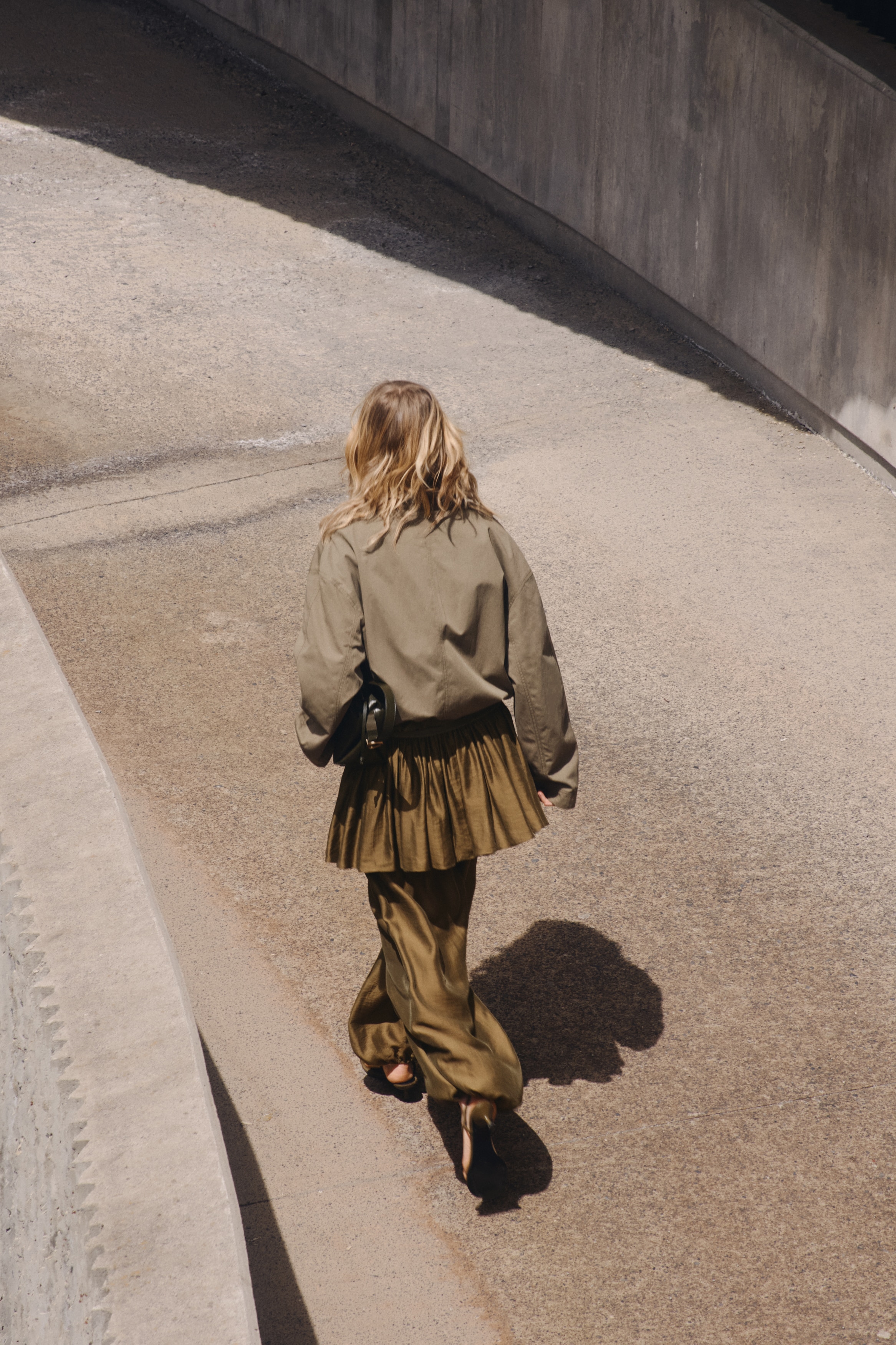 Skirt-layered balloon trousers