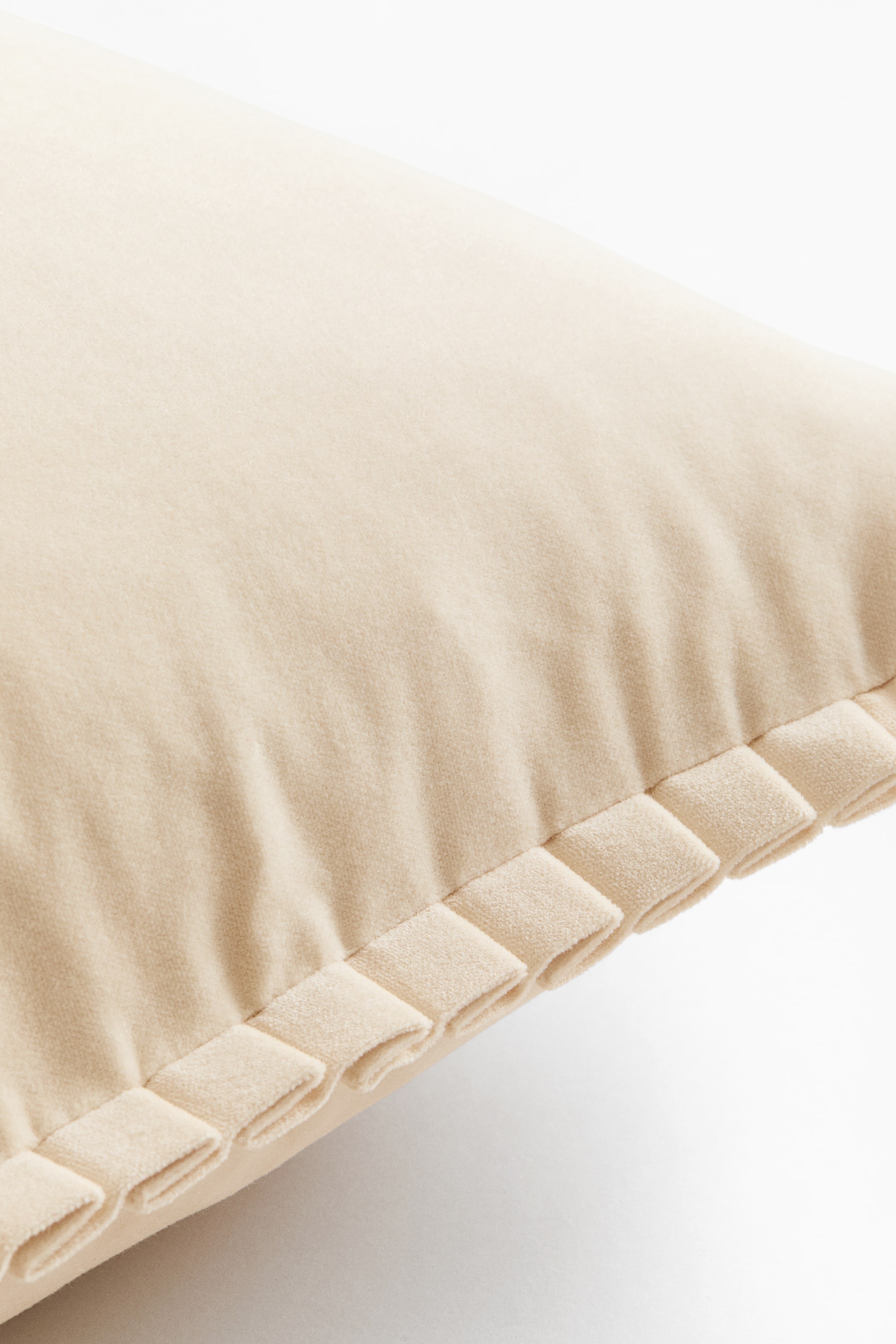 Housse de coussin plissée en velours